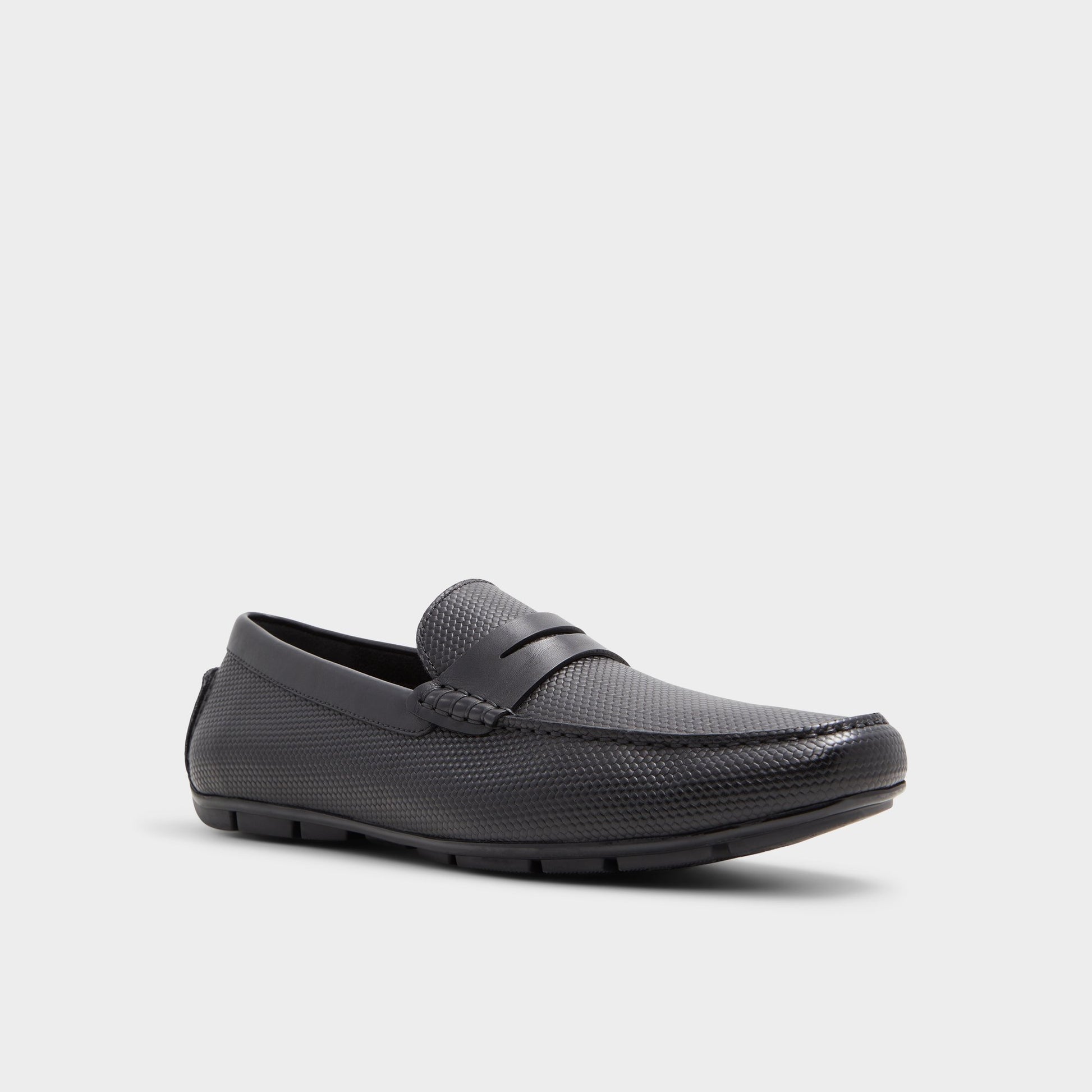 Three-quarter angle of Black Discourse Driving shoe's front side