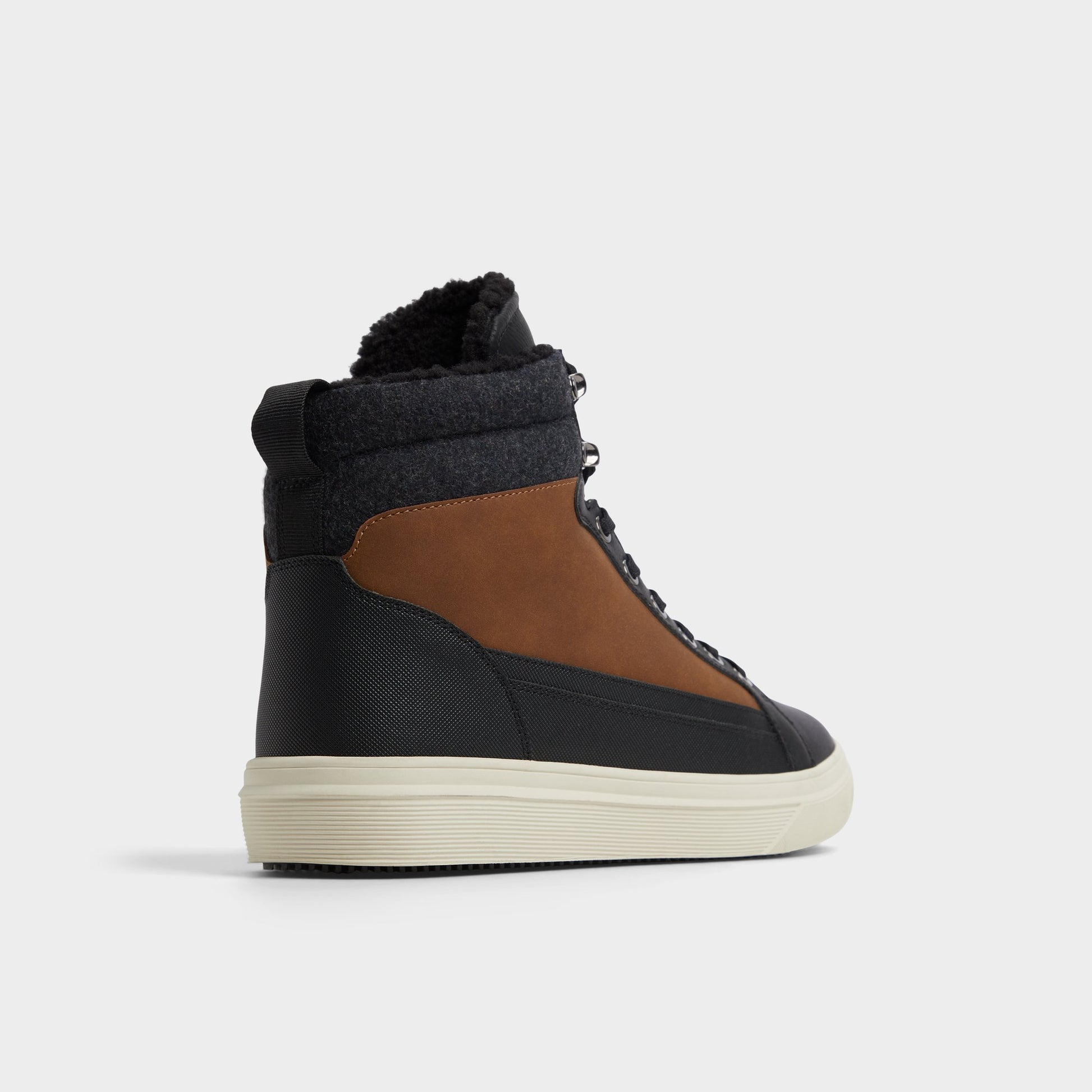 Three-quarter angle of Cognac Tannon Lace-up boot's back side