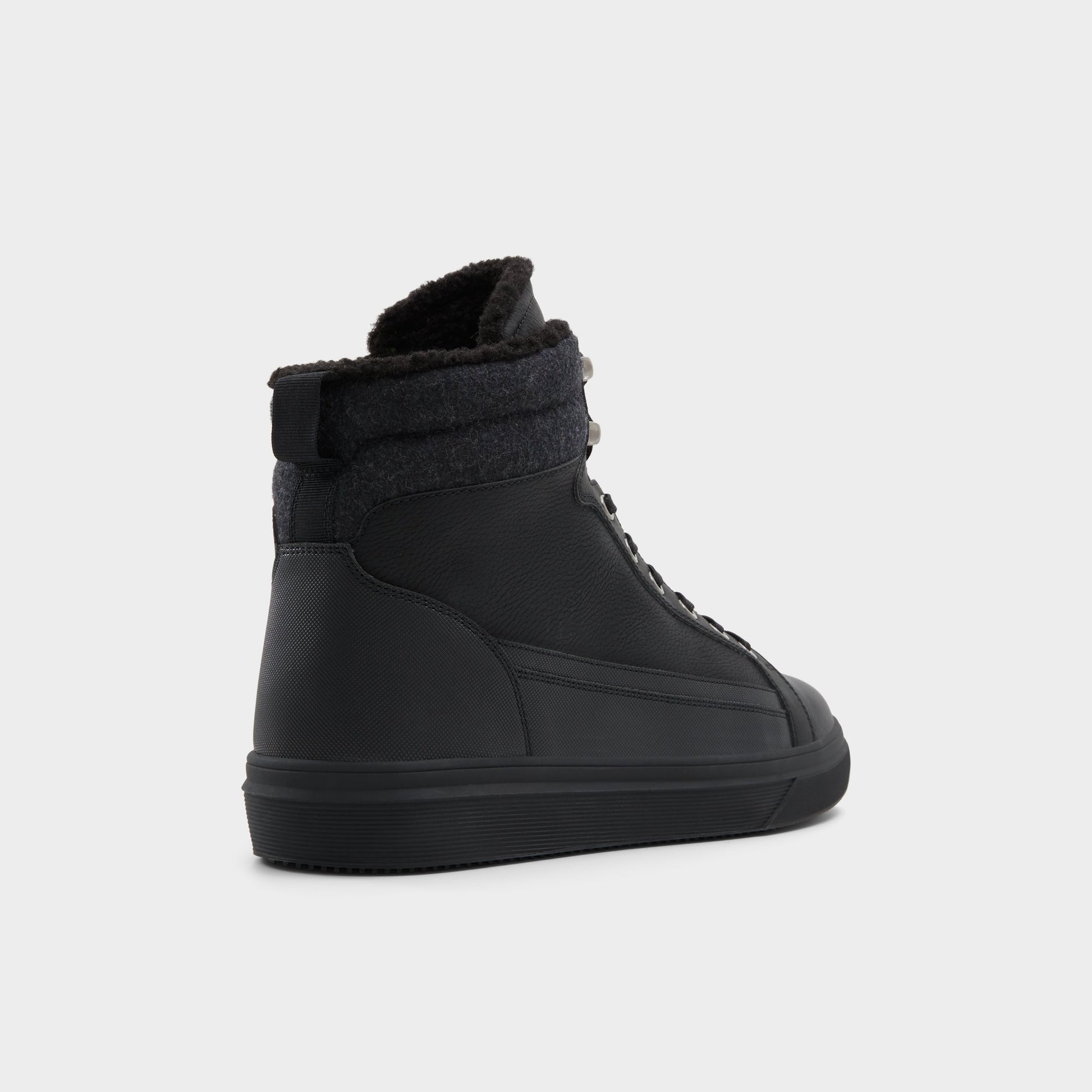 Three-quarter angle of Black Tannon Lace-up boot's back side