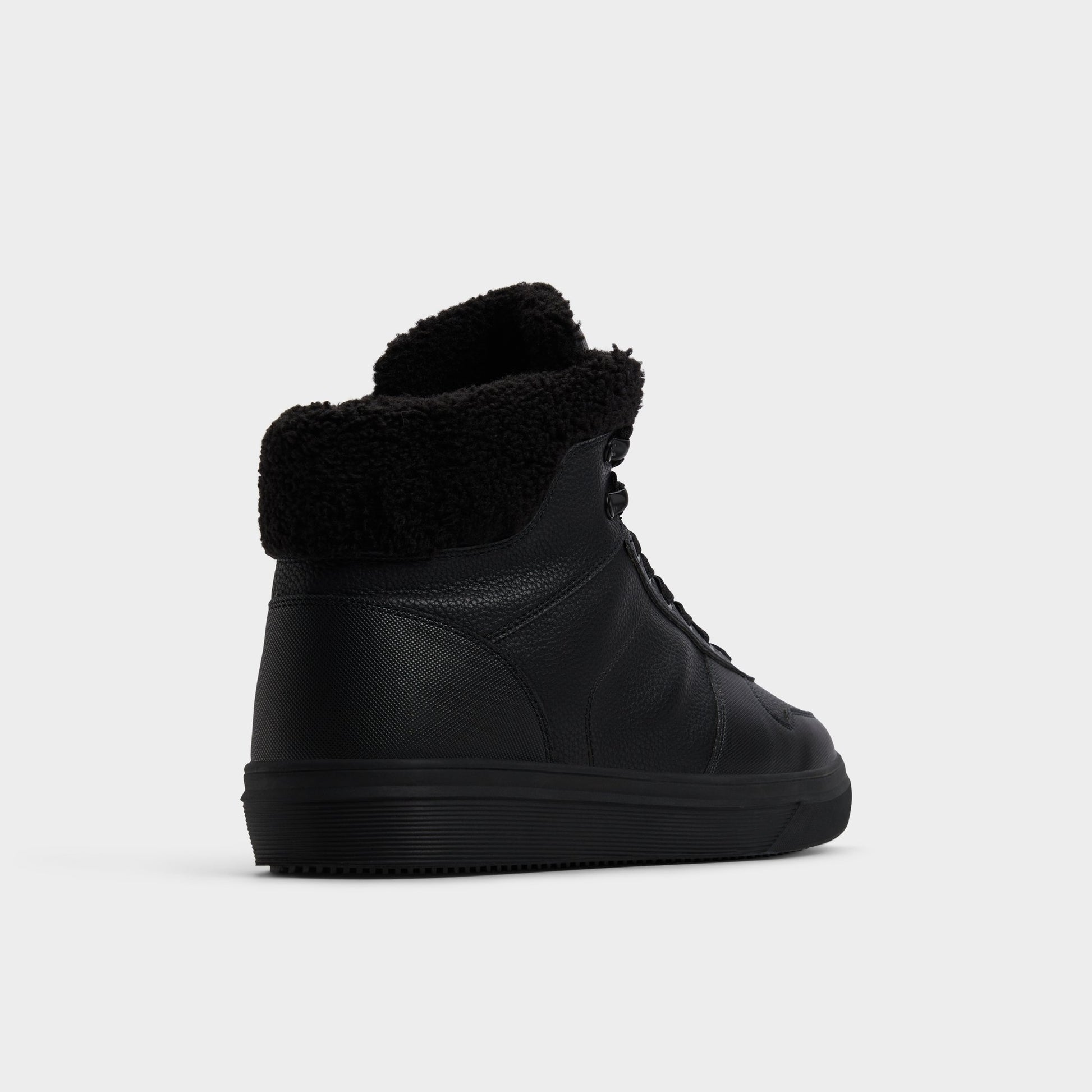 Three-quarter angle of Black Smithy Lace-up boot's back side