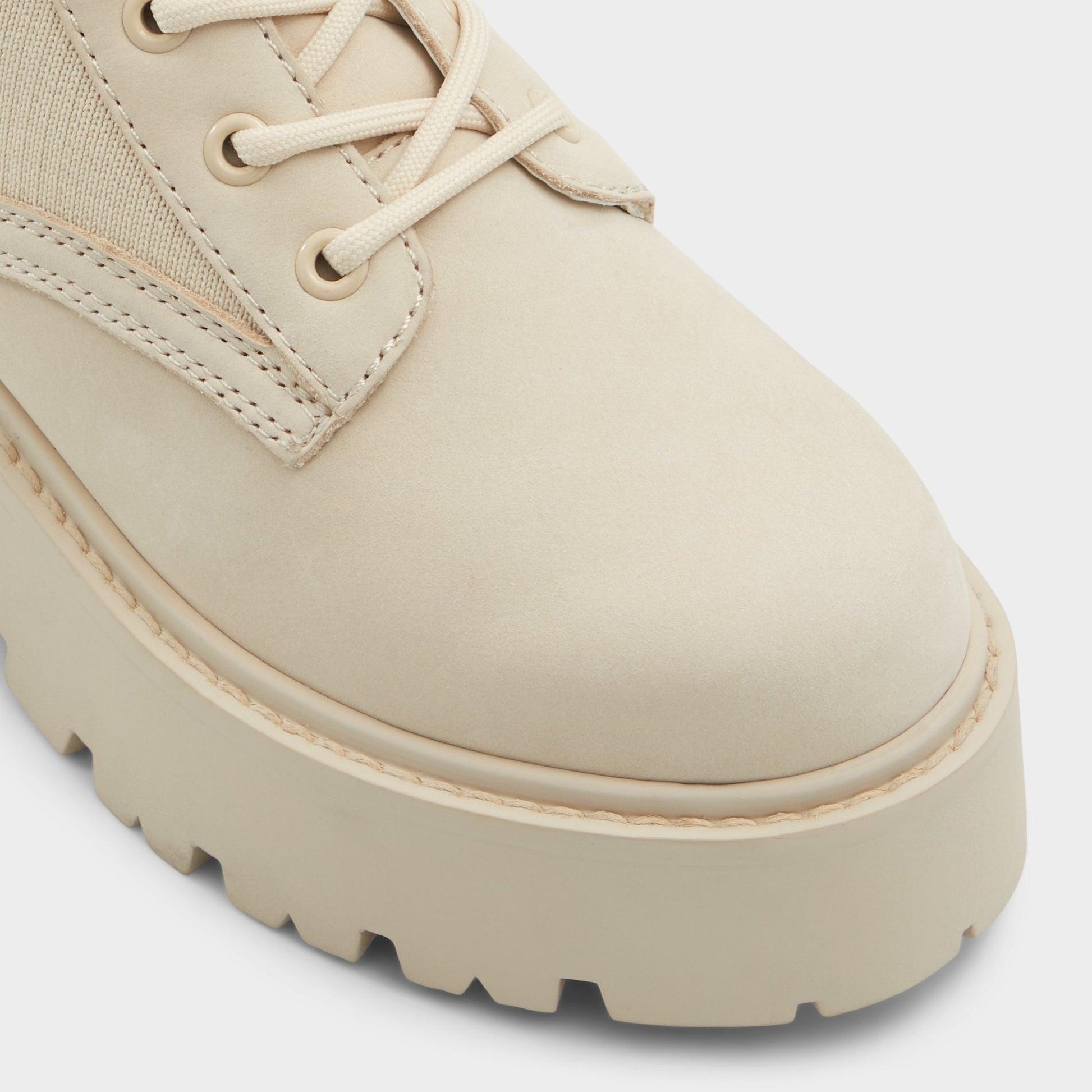Close-up of the Beige Talaleryknit Combat ankle boot