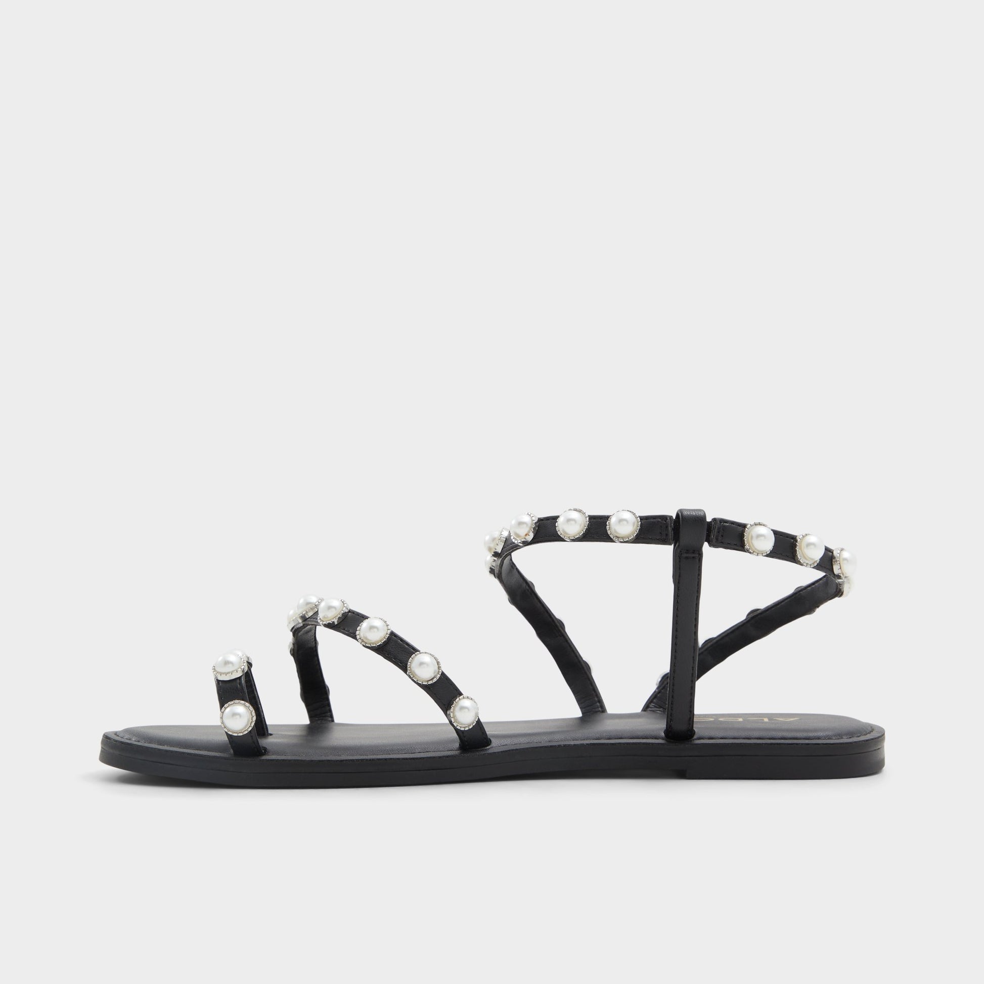 Side view of Black Coreydale Strappy flat sandal