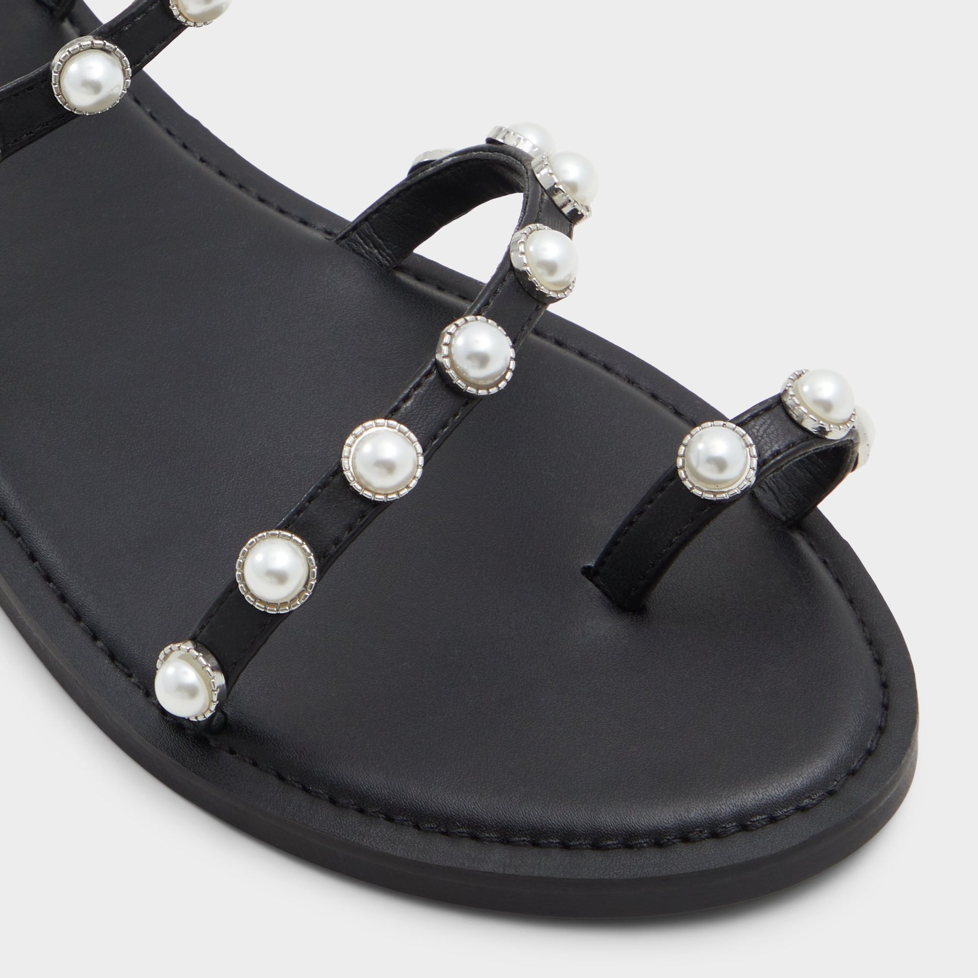 Close-up of the Black Coreydale Strappy flat sandal