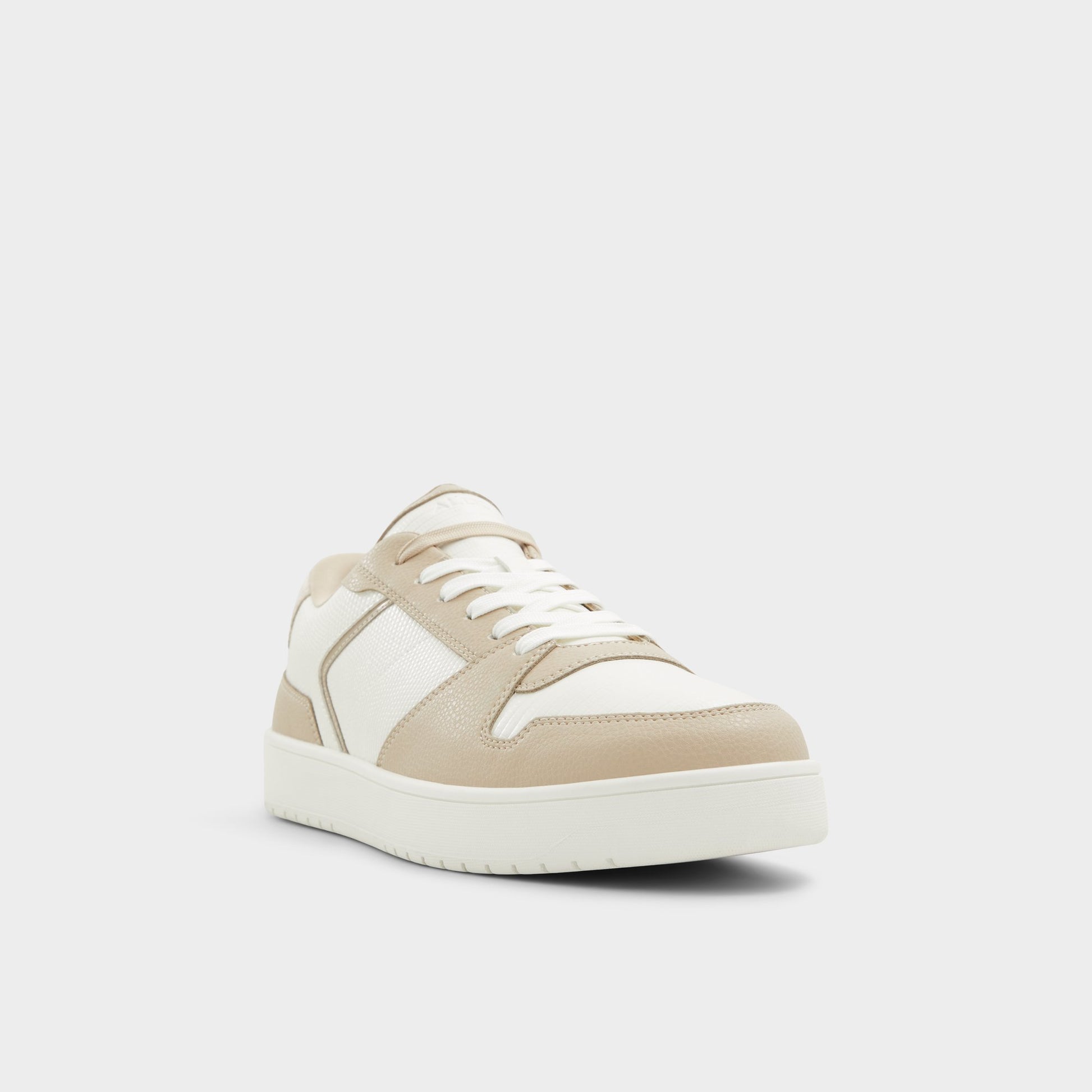 Three-quarter angle of White Combo Zethan Low top sneaker's front side