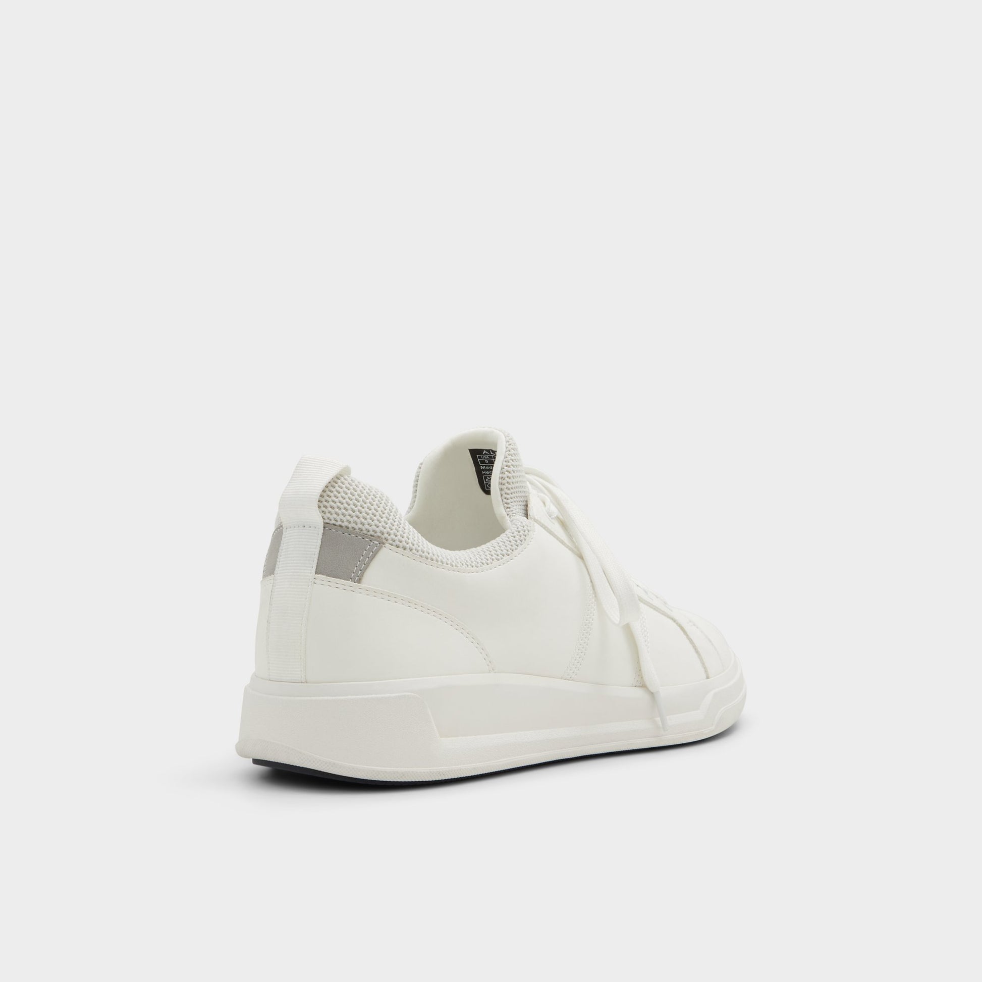 Three-quarter angle of White Prasien Low top sneaker's back side