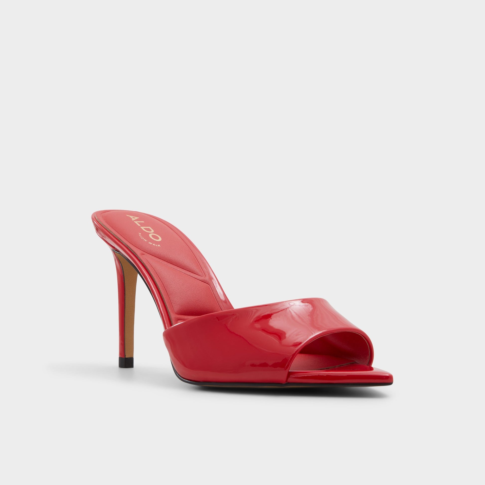 Three-quarter angle of Red Anniebrilden Heeled mule's front side