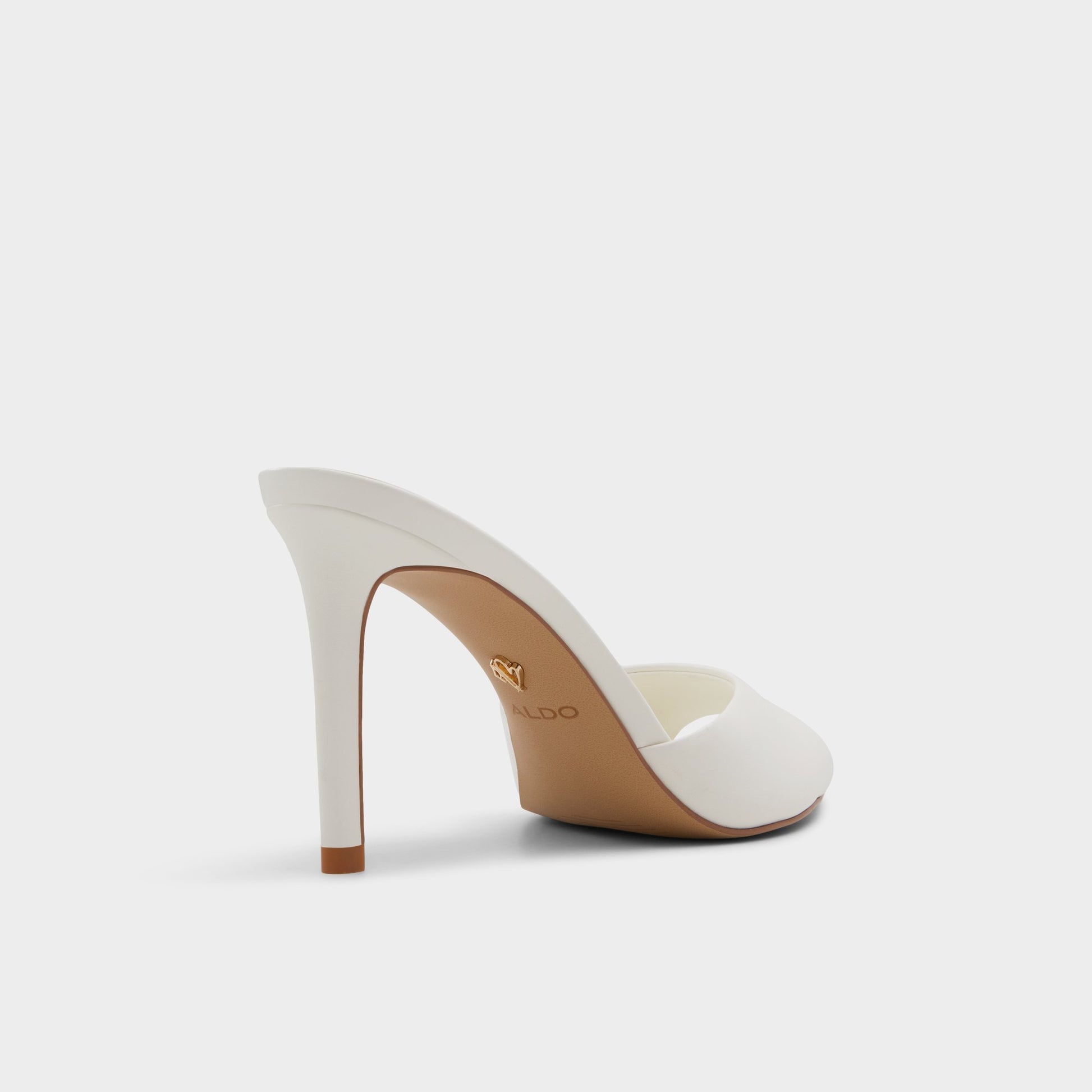 Three-quarter angle of White Anniebrilden Heeled mule's back side