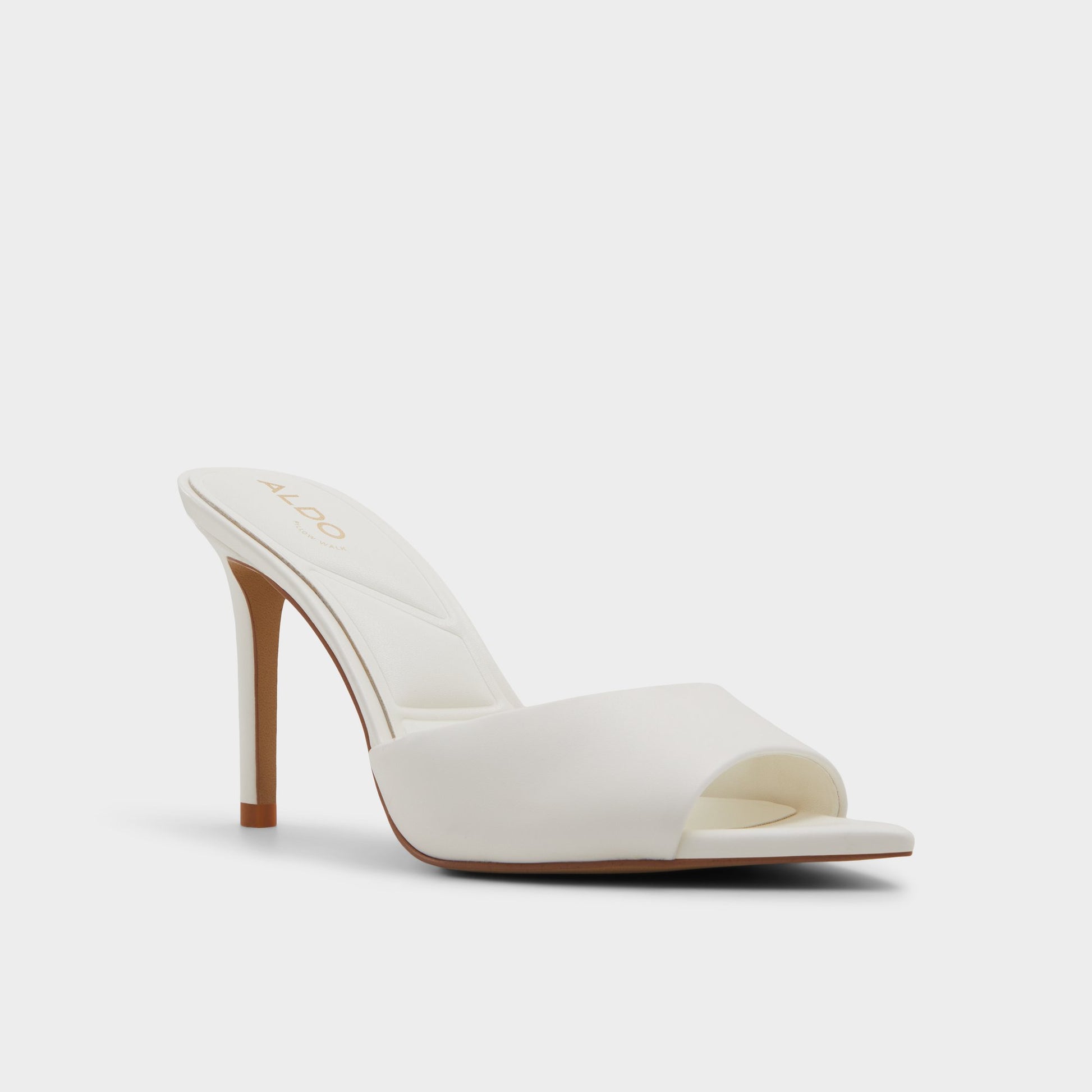 Three-quarter angle of White Anniebrilden Heeled mule's front side