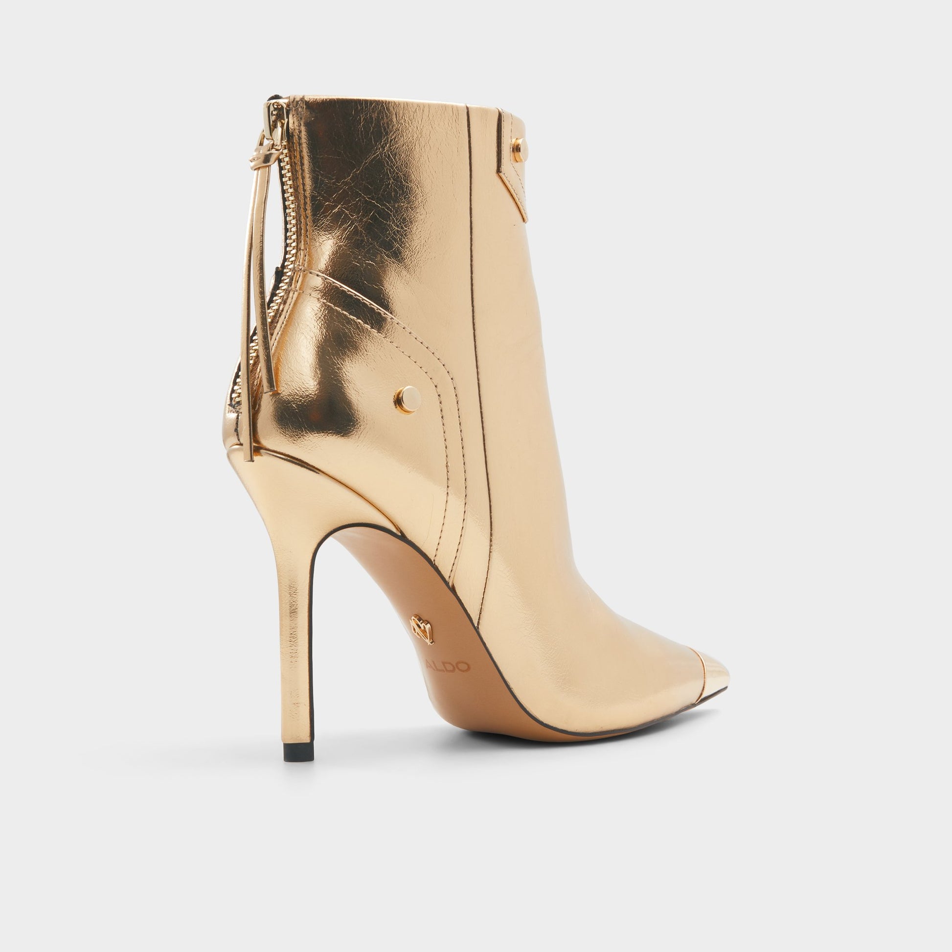 Three-quarter angle of Gold Nilita Ankle boot's back side