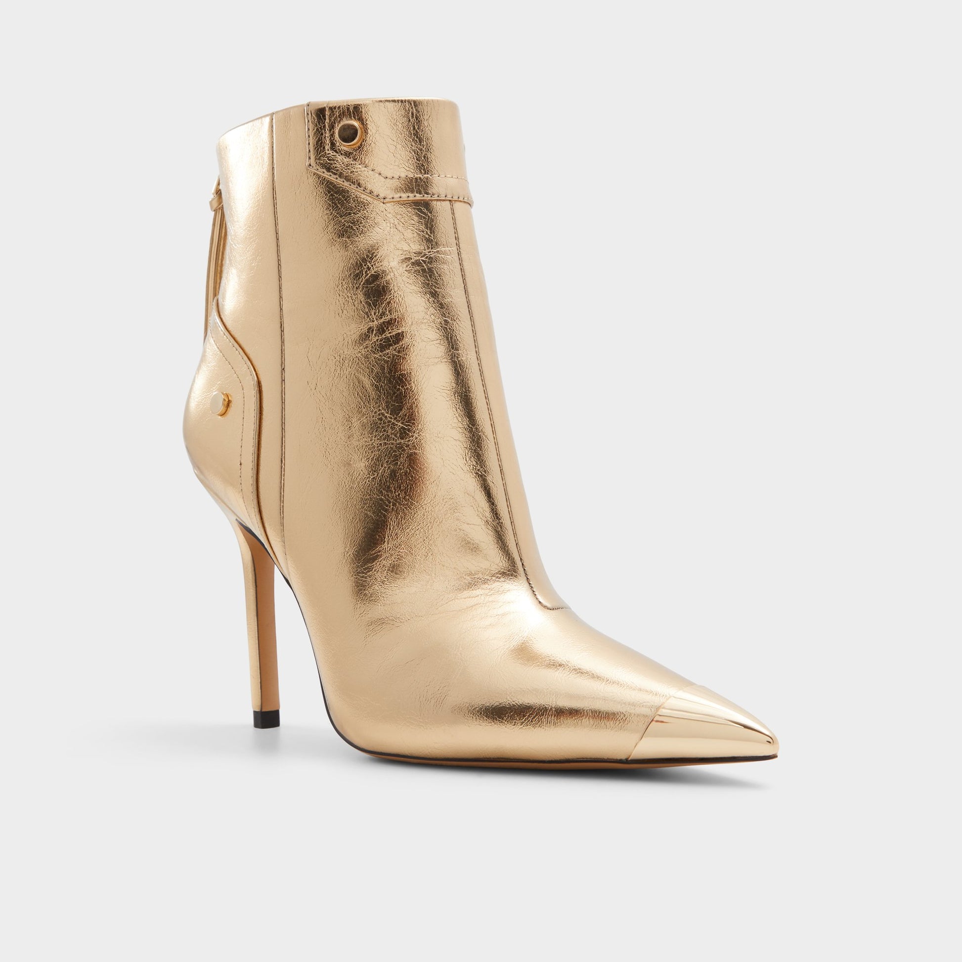 Three-quarter angle of Gold Nilita Ankle boot's front side