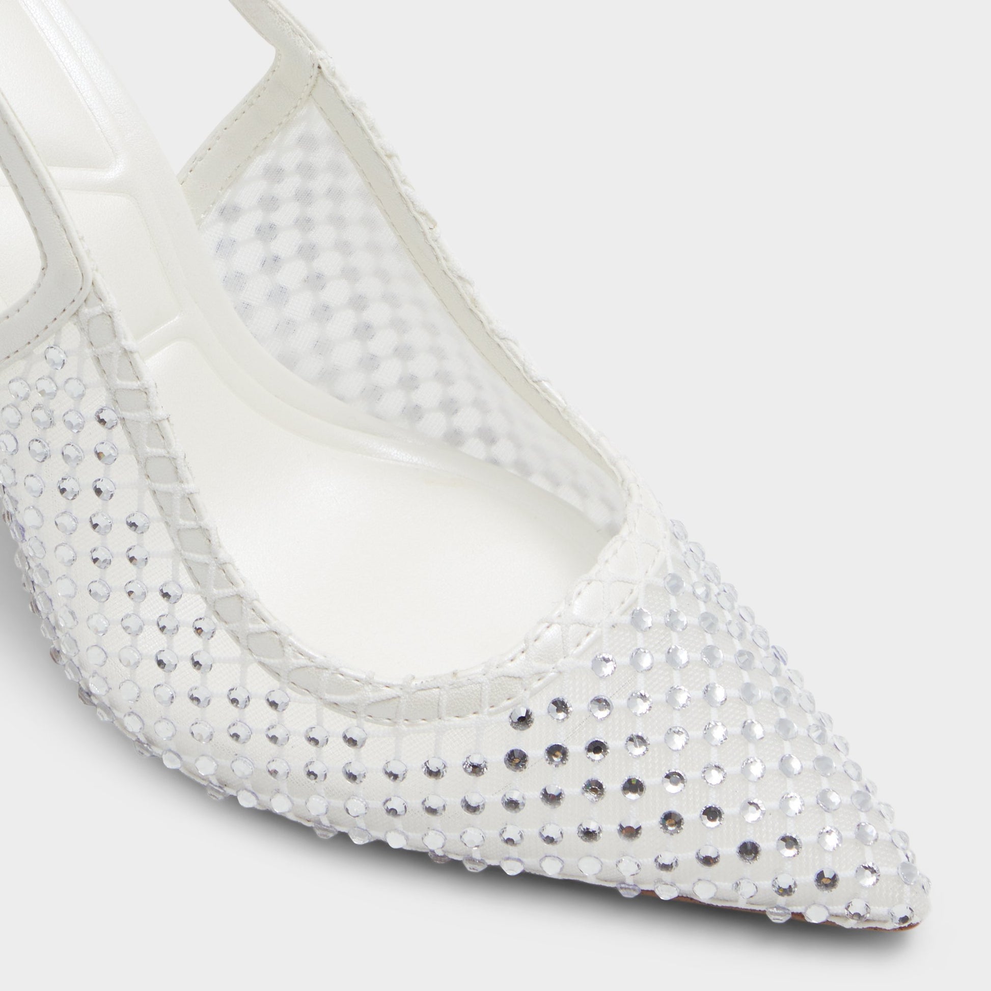 Close-up of the White/Bone Marciana Slingback heel