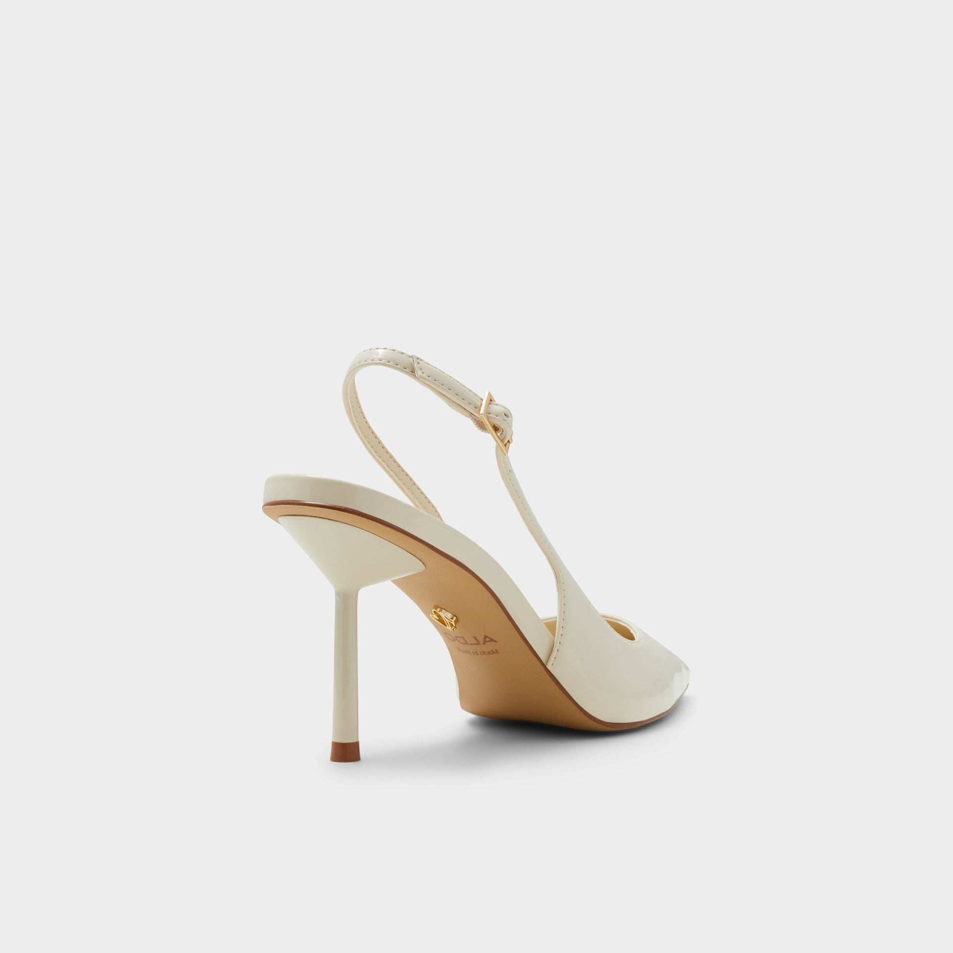 Three-quarter angle of Light Beige Seralina Slingback heel's back side
