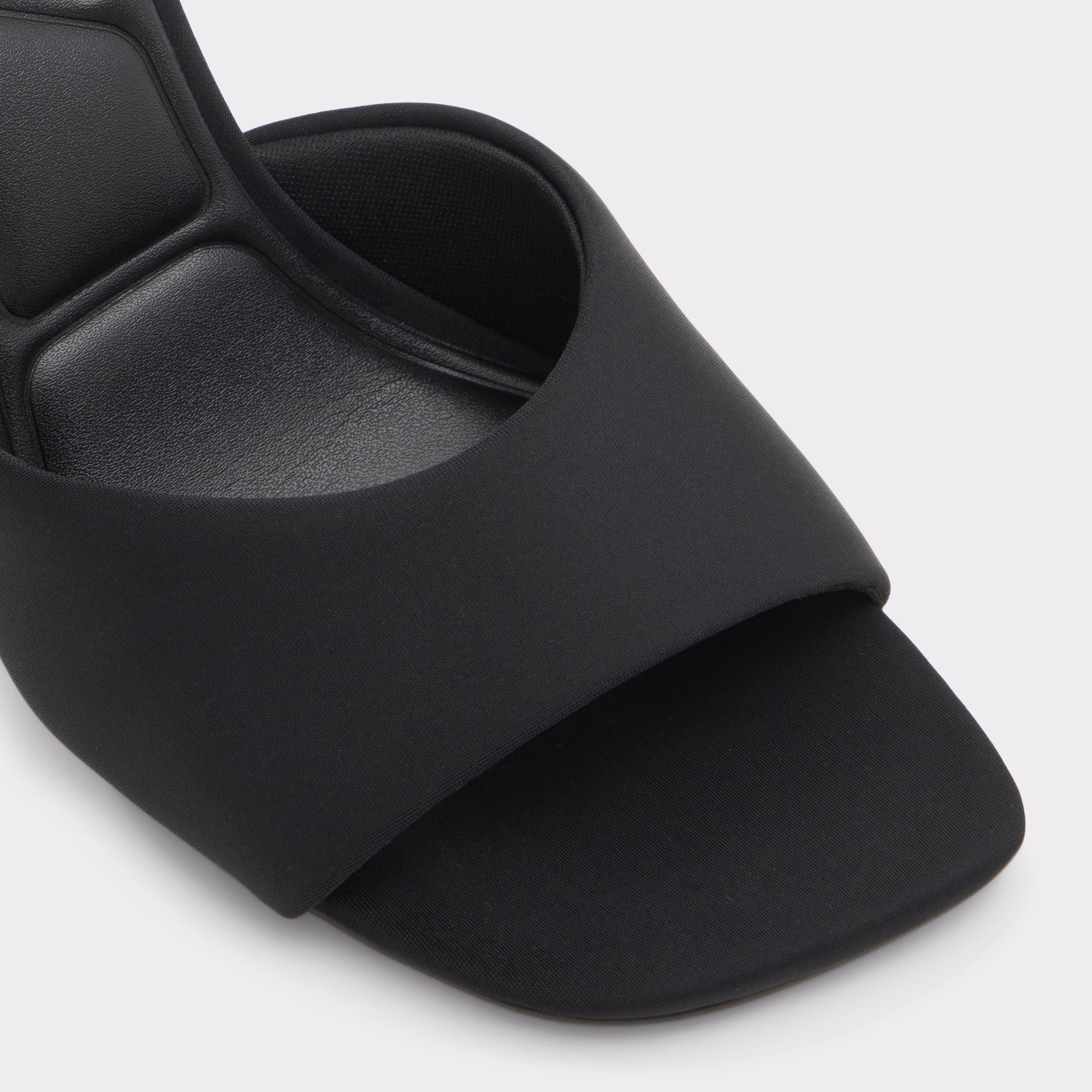 Close-up of the Black Evadalia Heeled mule