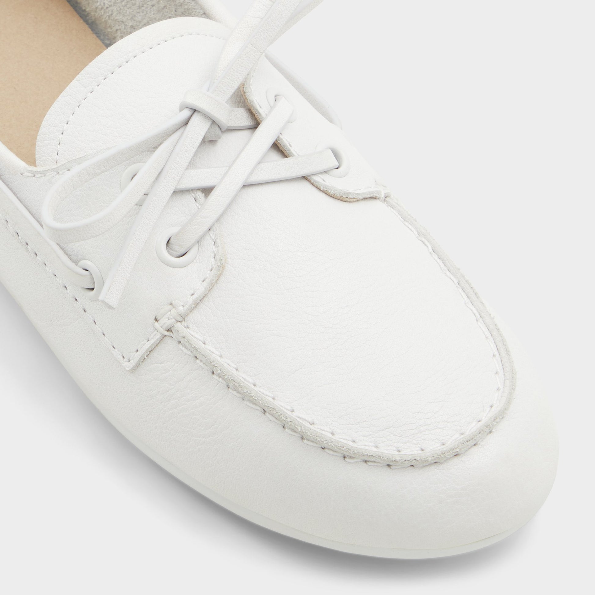 Close-up of the White/Bone Sail Boat shoe
