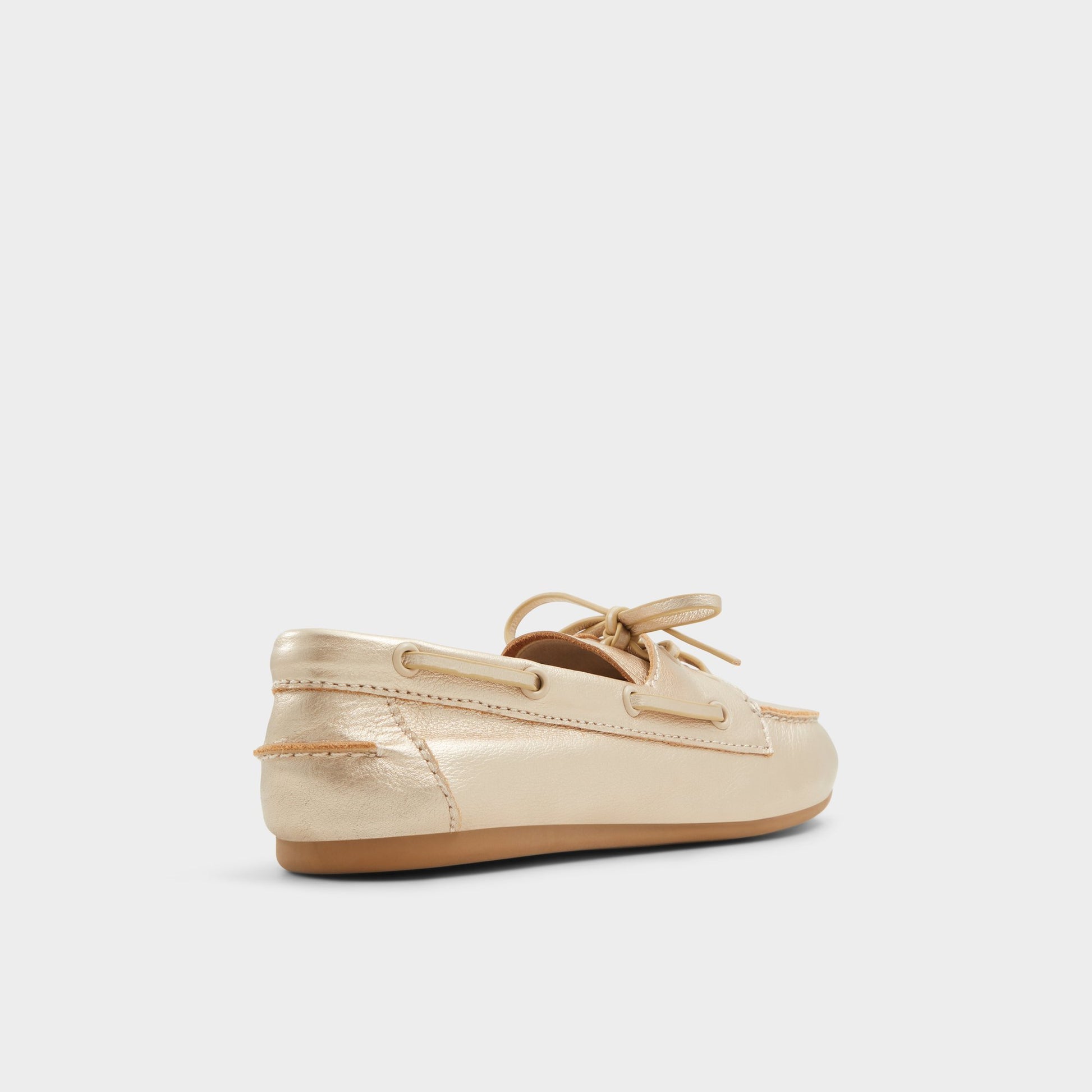 Three-quarter angle of Gold Sail Boat shoe's back side