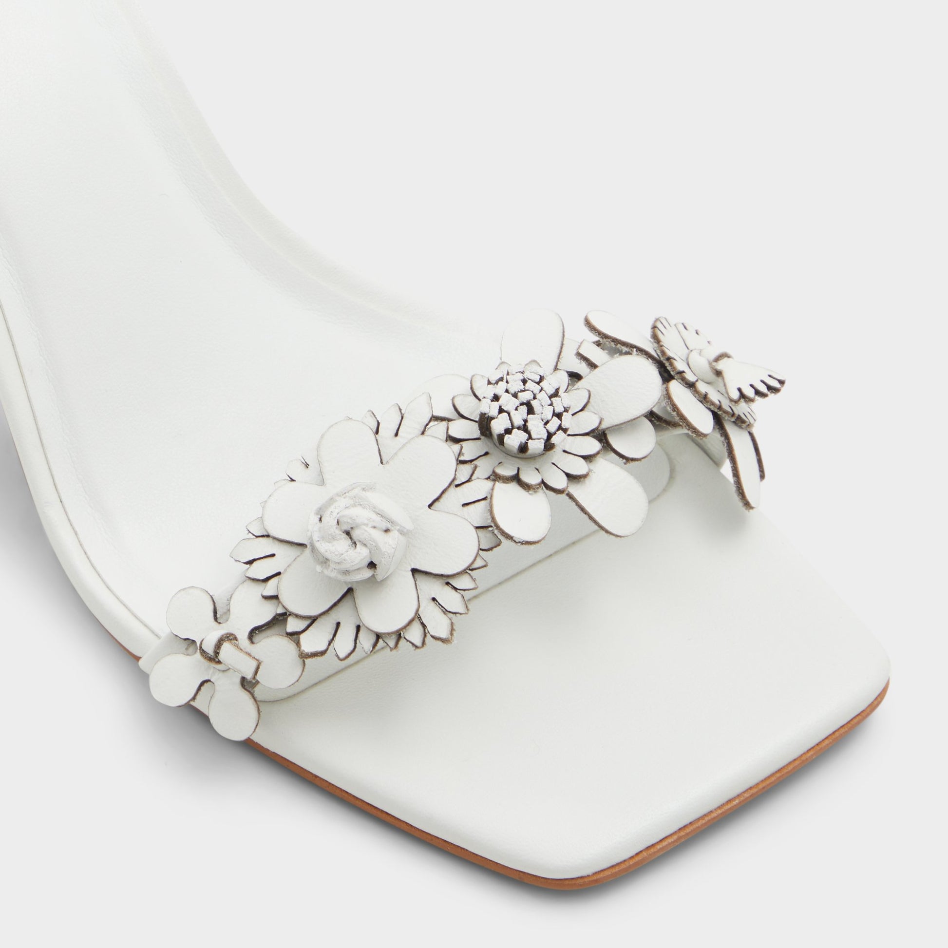 Close-up of the White/Bone Fiorela Strappy heeled sandal