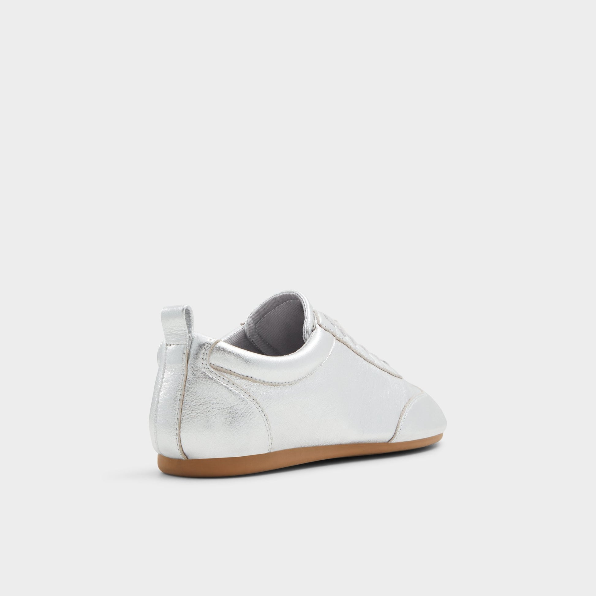 Three-quarter angle of Silver Swiftlyy Low top sneaker's back side