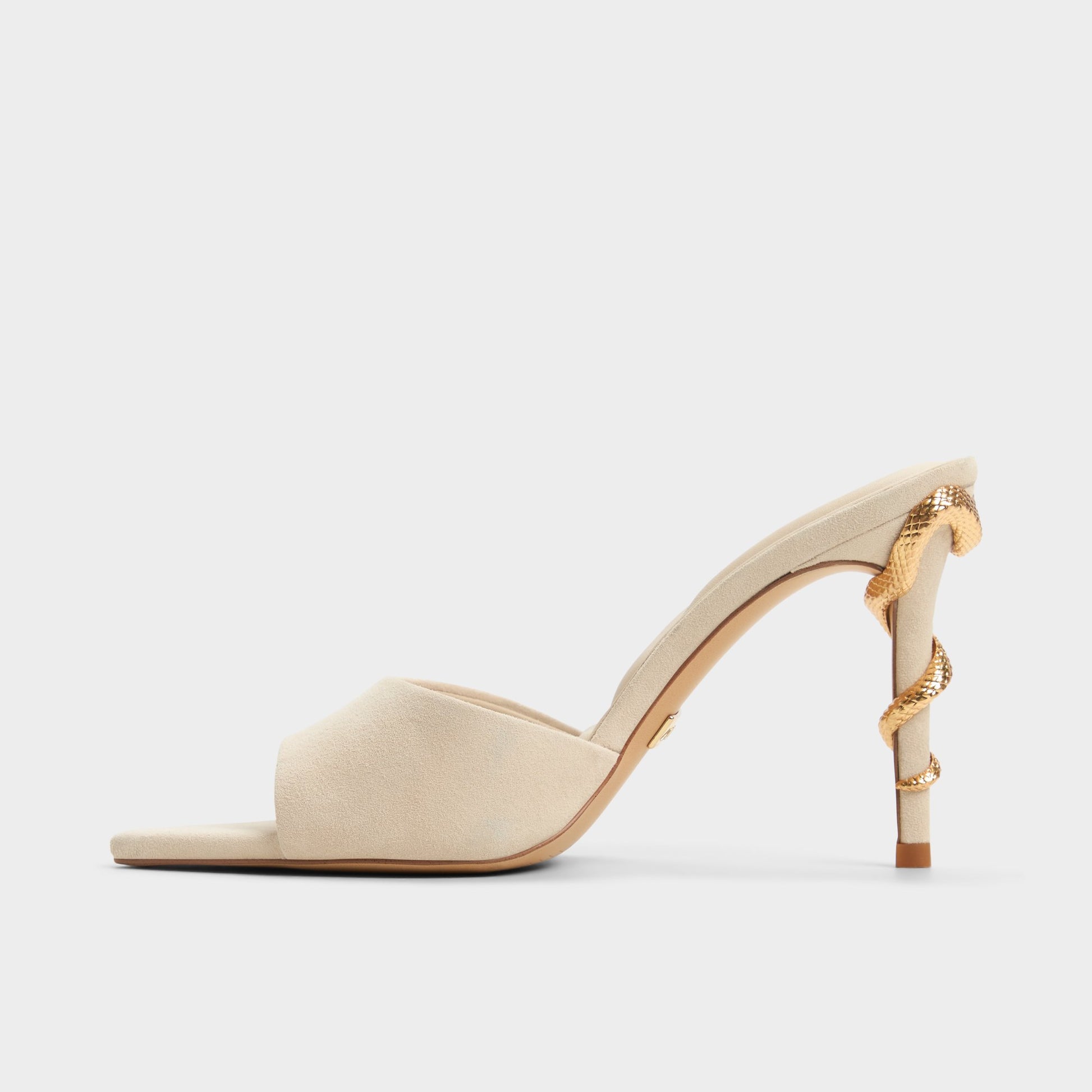 Side view of Bone Seashella Heeled mule