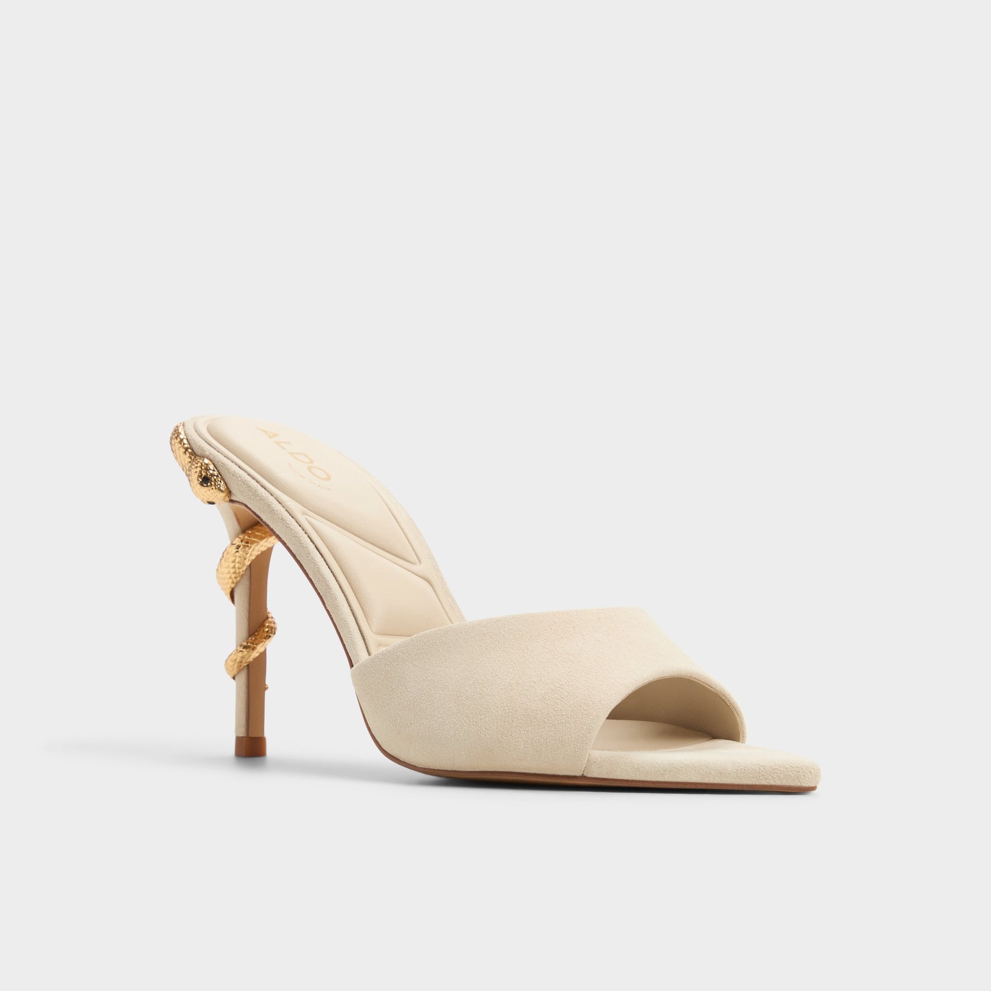 Three-quarter angle of Bone Seashella Heeled mule's front side