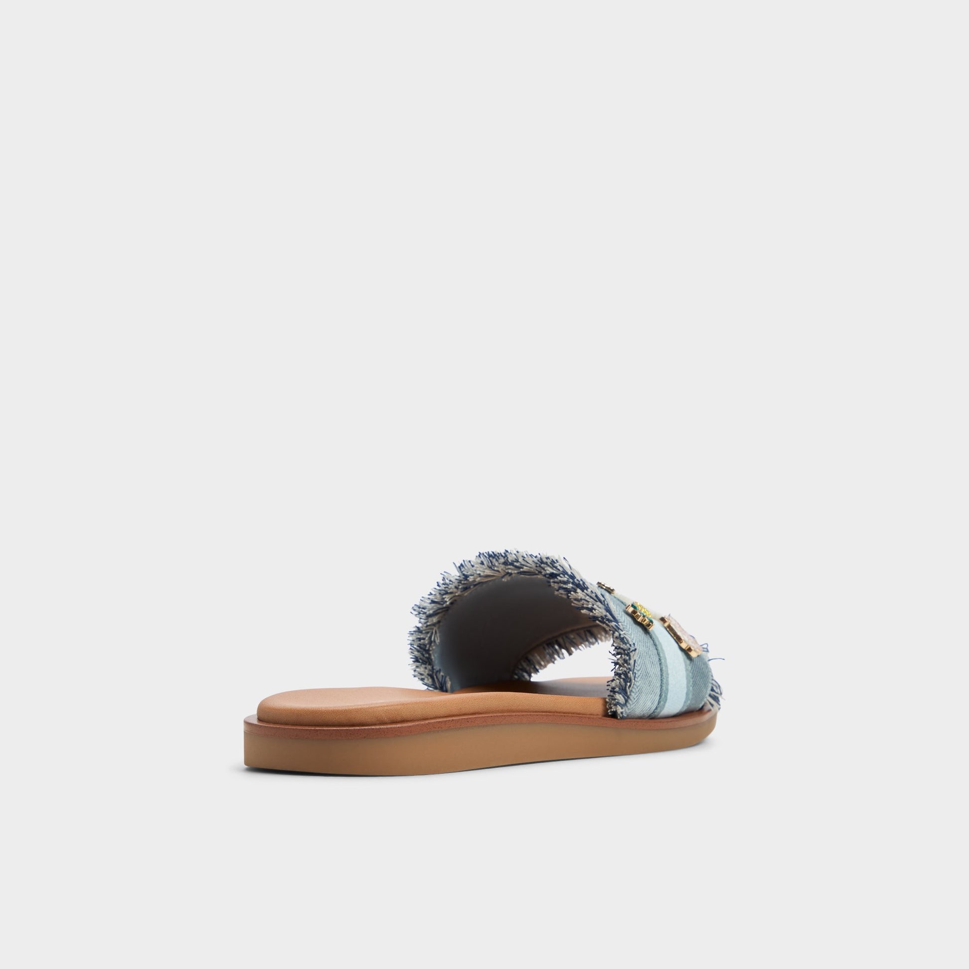 Three-quarter angle of Denim Beachside Slide sandal's back side