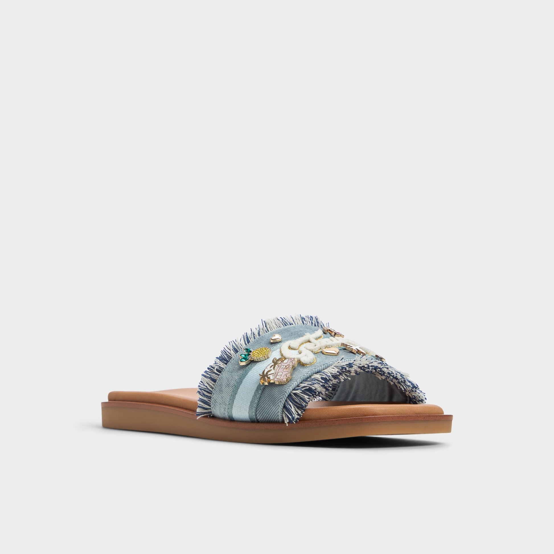 Three-quarter angle of Denim Beachside Slide sandal's front side