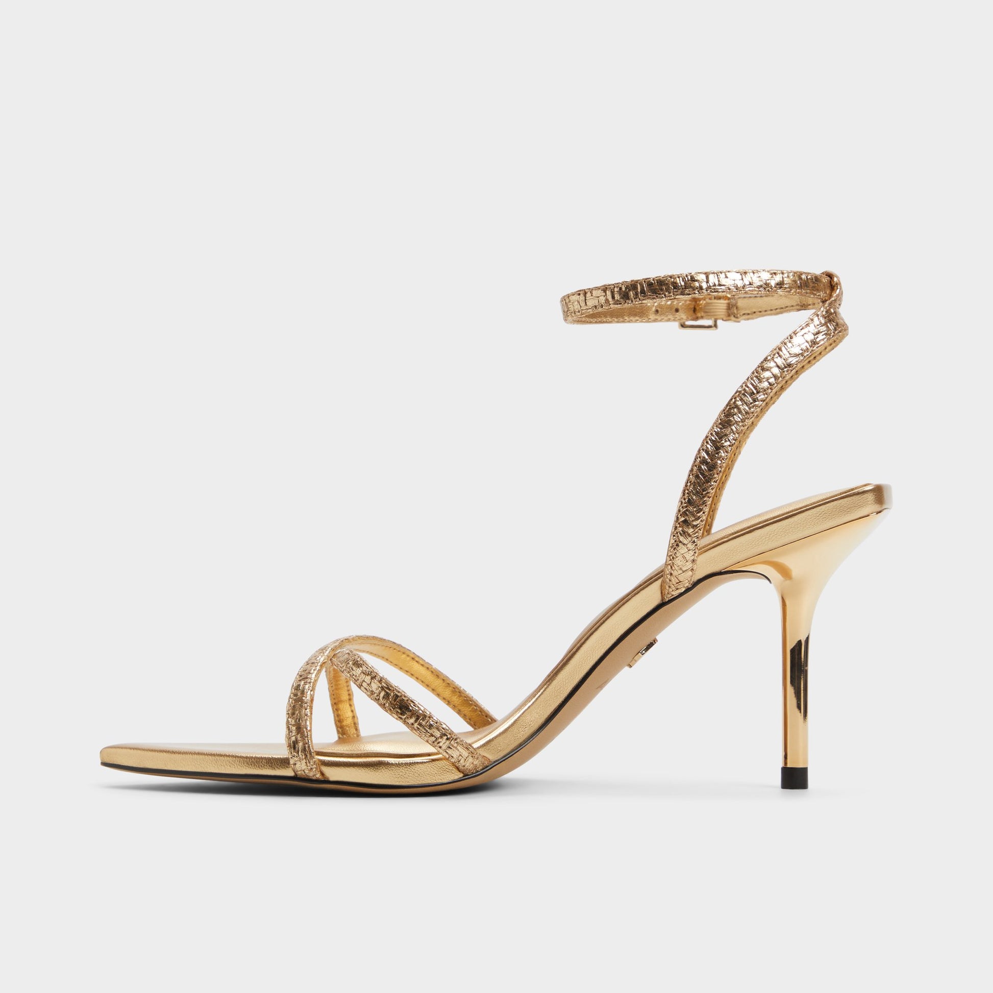 Side view of Gold Adrina Strappy heeled sandal