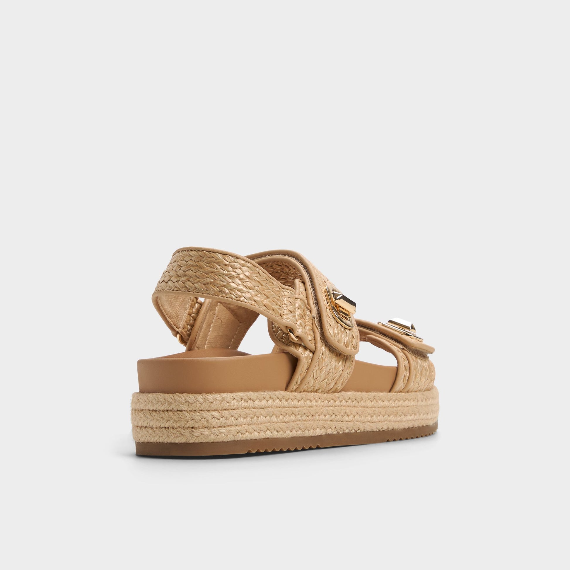 Three-quarter angle of Open Natural Sunhaven Footbed sandal's back side