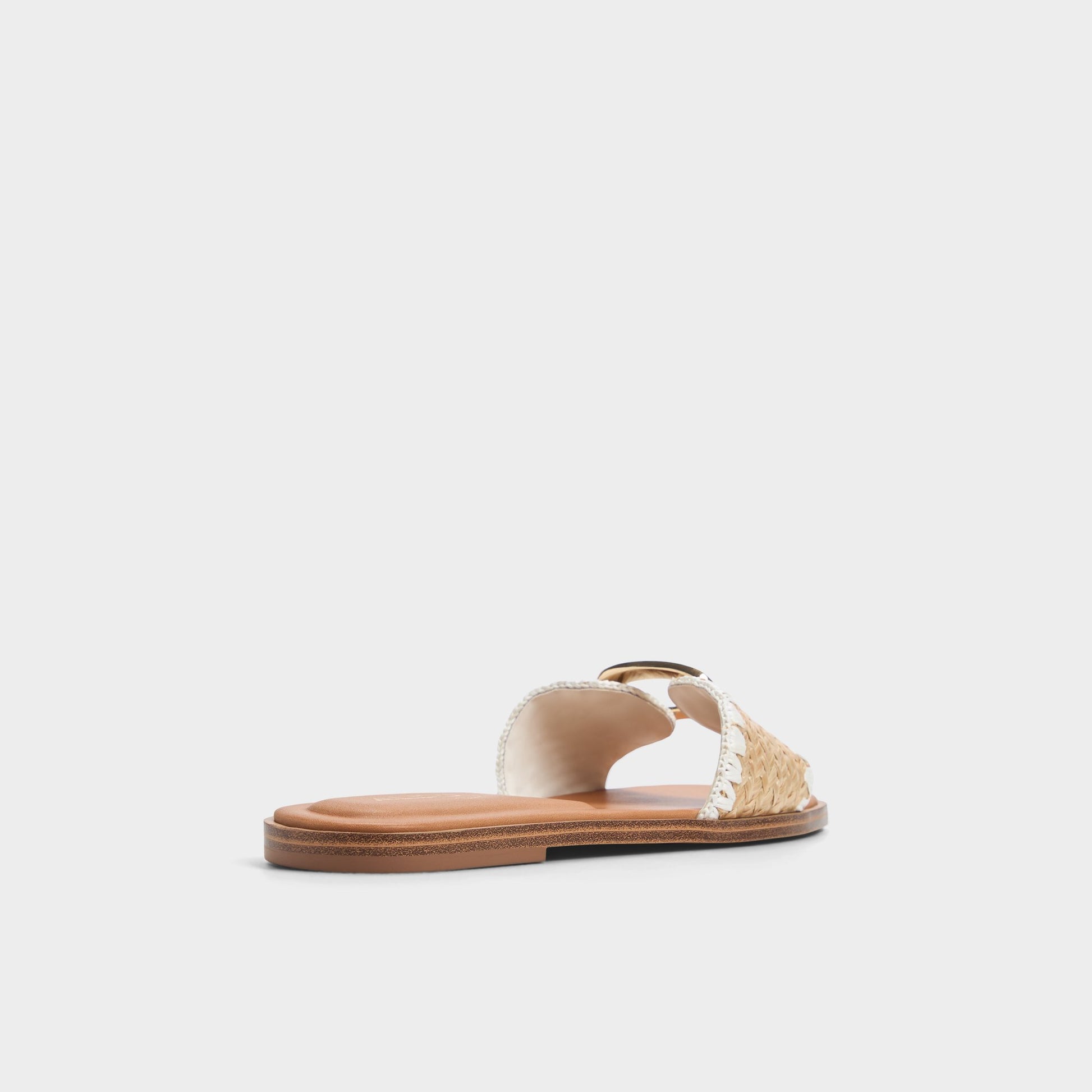 Three-quarter angle of Open Natural Tidella Slide sandal's back side