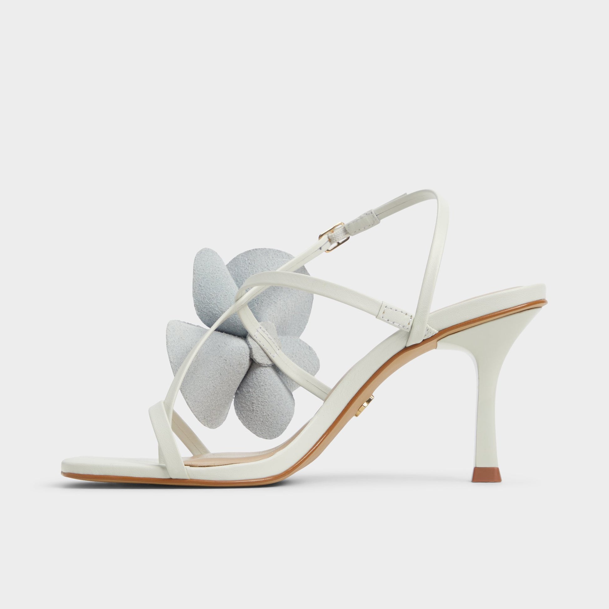 Side view of White/Bone Sandflower Strappy heeled sandal