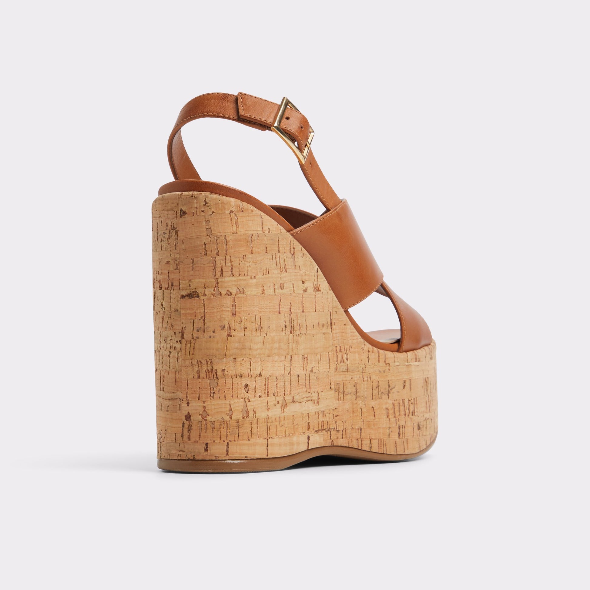 Three-quarter angle of Light Brown Sandcastle Strappy wedge sandal's back side