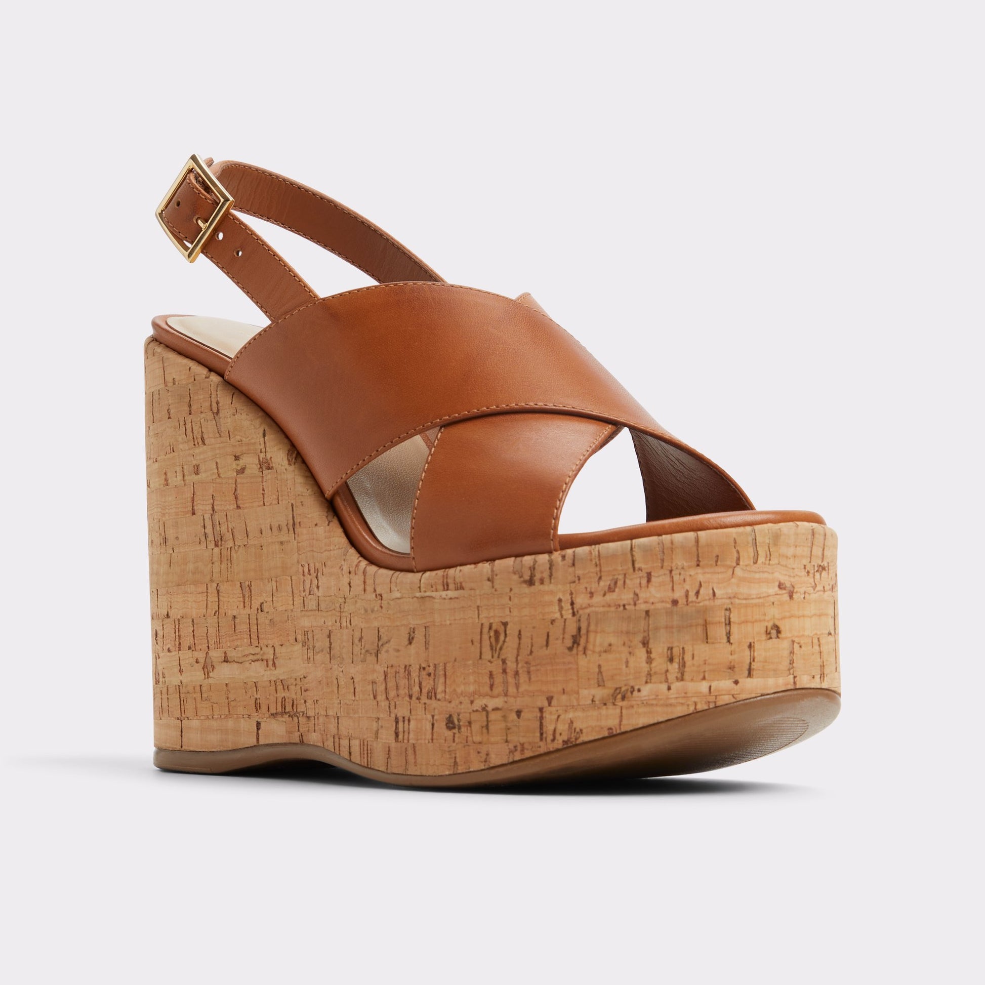 Three-quarter angle of Light Brown Sandcastle Strappy wedge sandal's front side