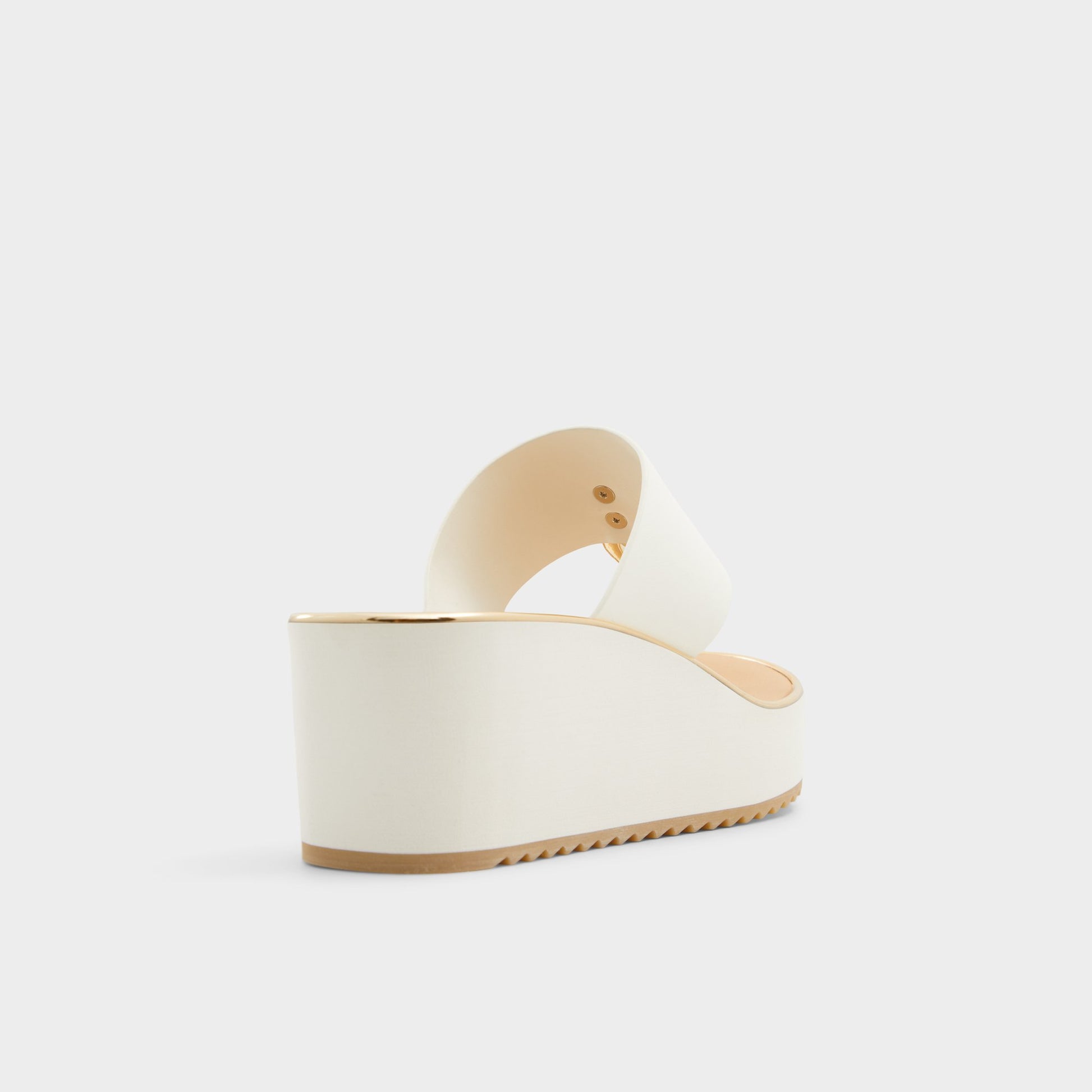 Three-quarter angle of White Penelopy Wedge sandal's back side