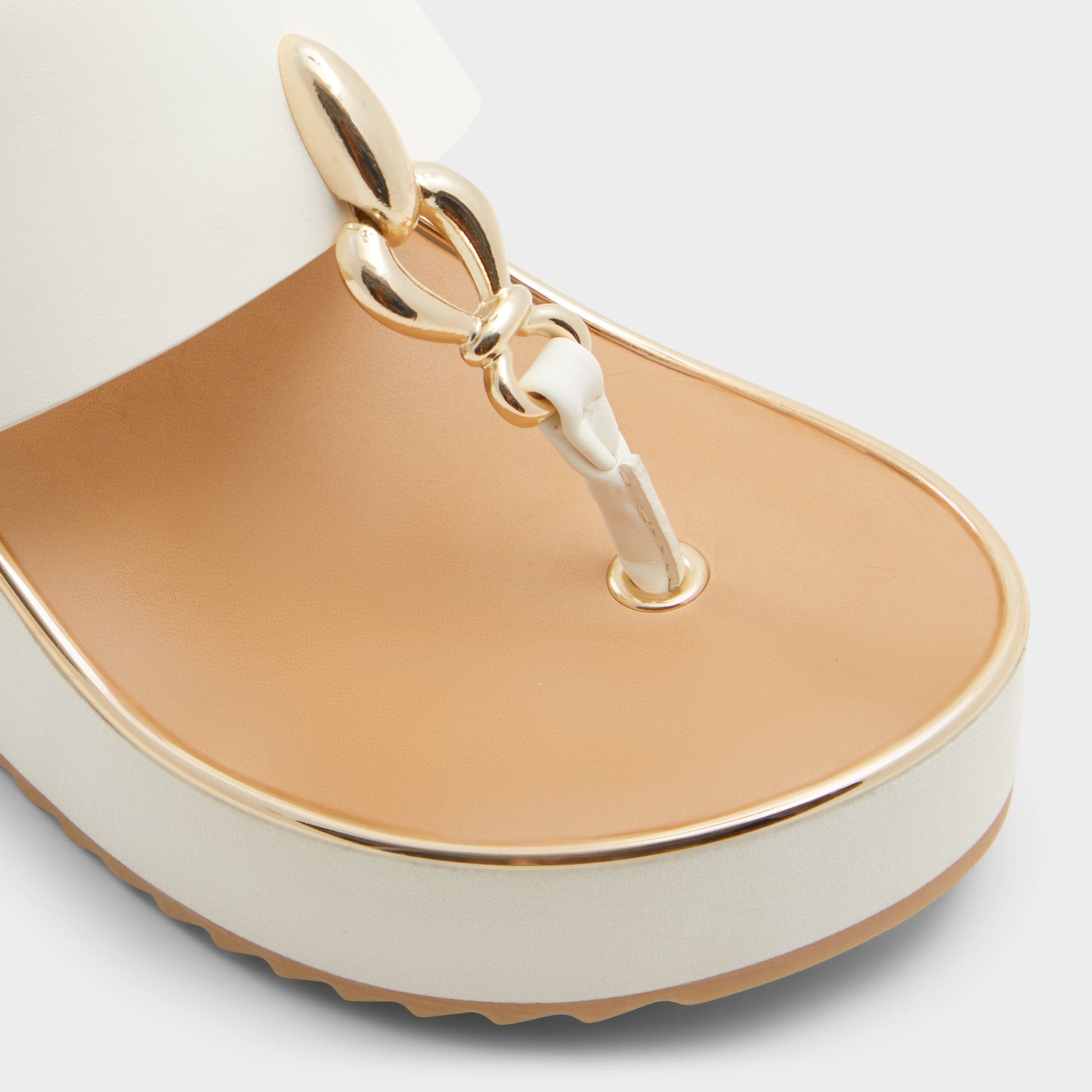 Close-up of the White Penelopy Wedge sandal
