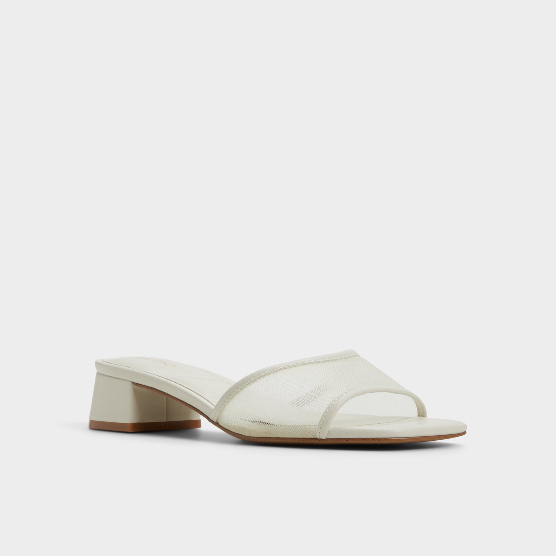 Three-quarter angle of White Rosamund Heeled mule's front side