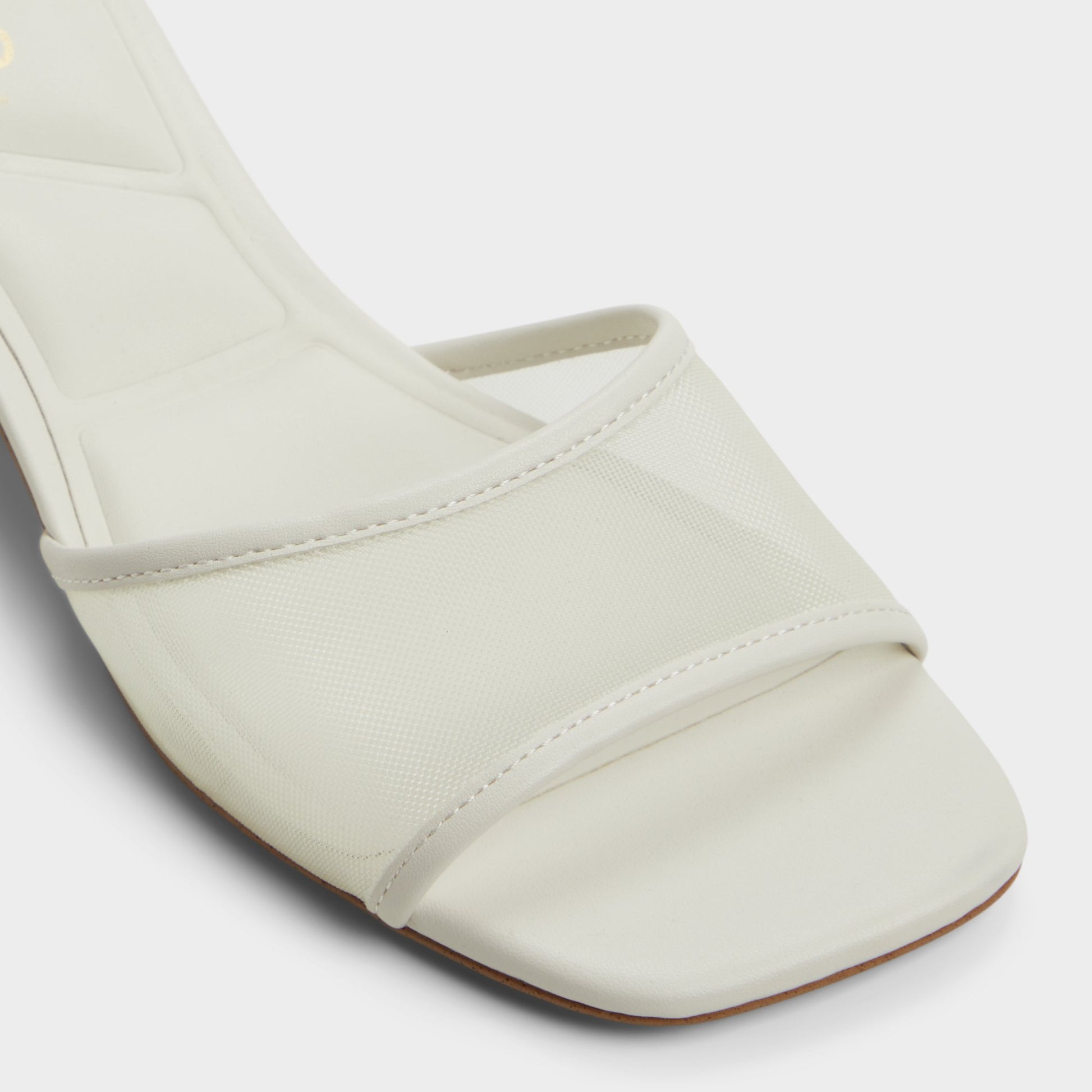Close-up of the White Rosamund Heeled mule