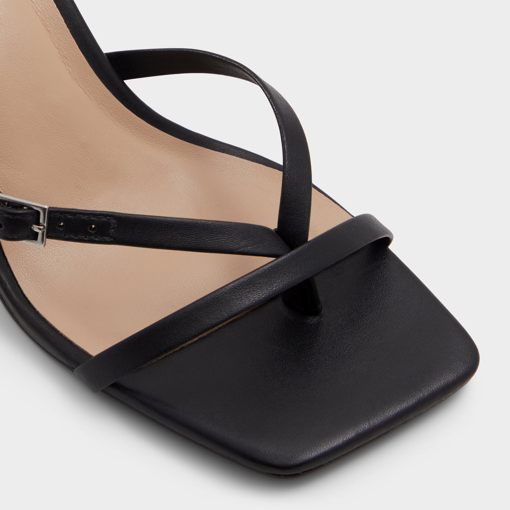 Close-up of the Black Gannever Heeled flip flop