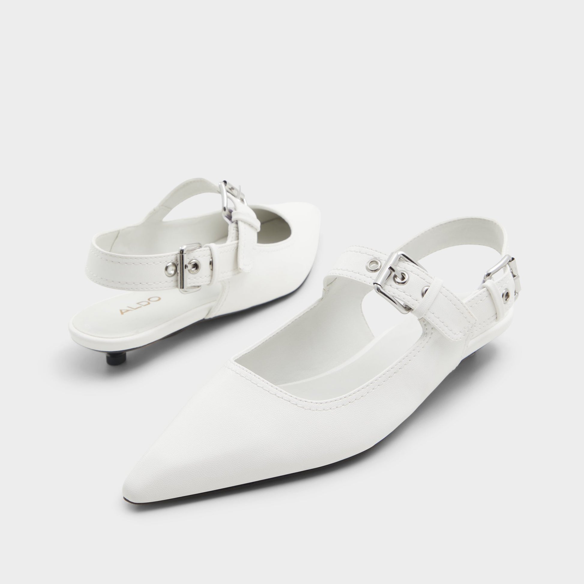 Highlighted view of a pair of White Kellya Sling back high heels