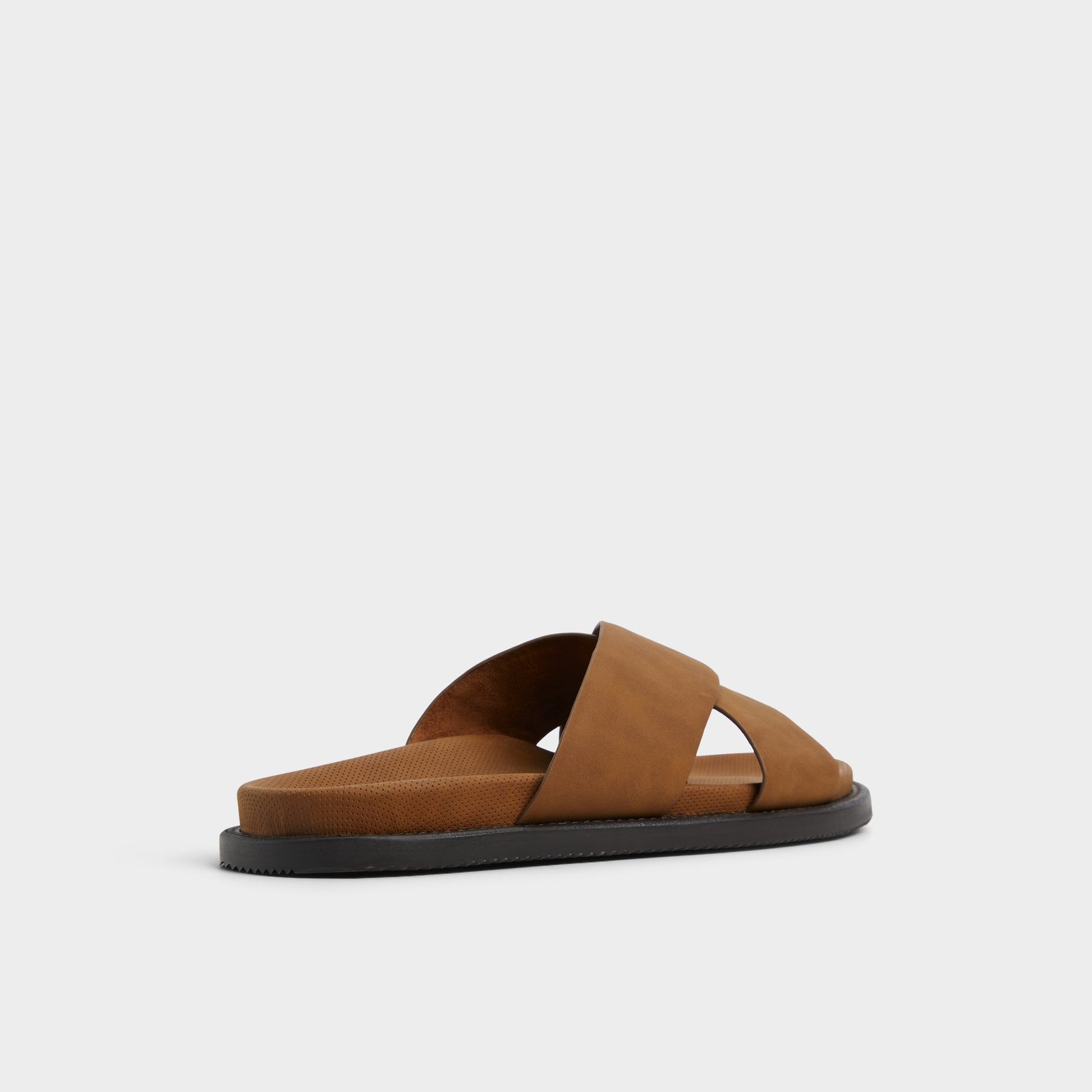 Three-quarter angle of Cognac Marrin Slide sandal's back side
