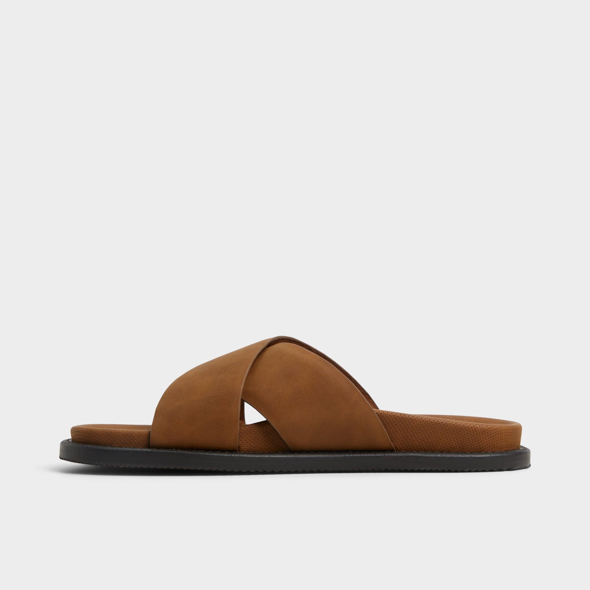 Side view of Cognac Marrin Slide sandal