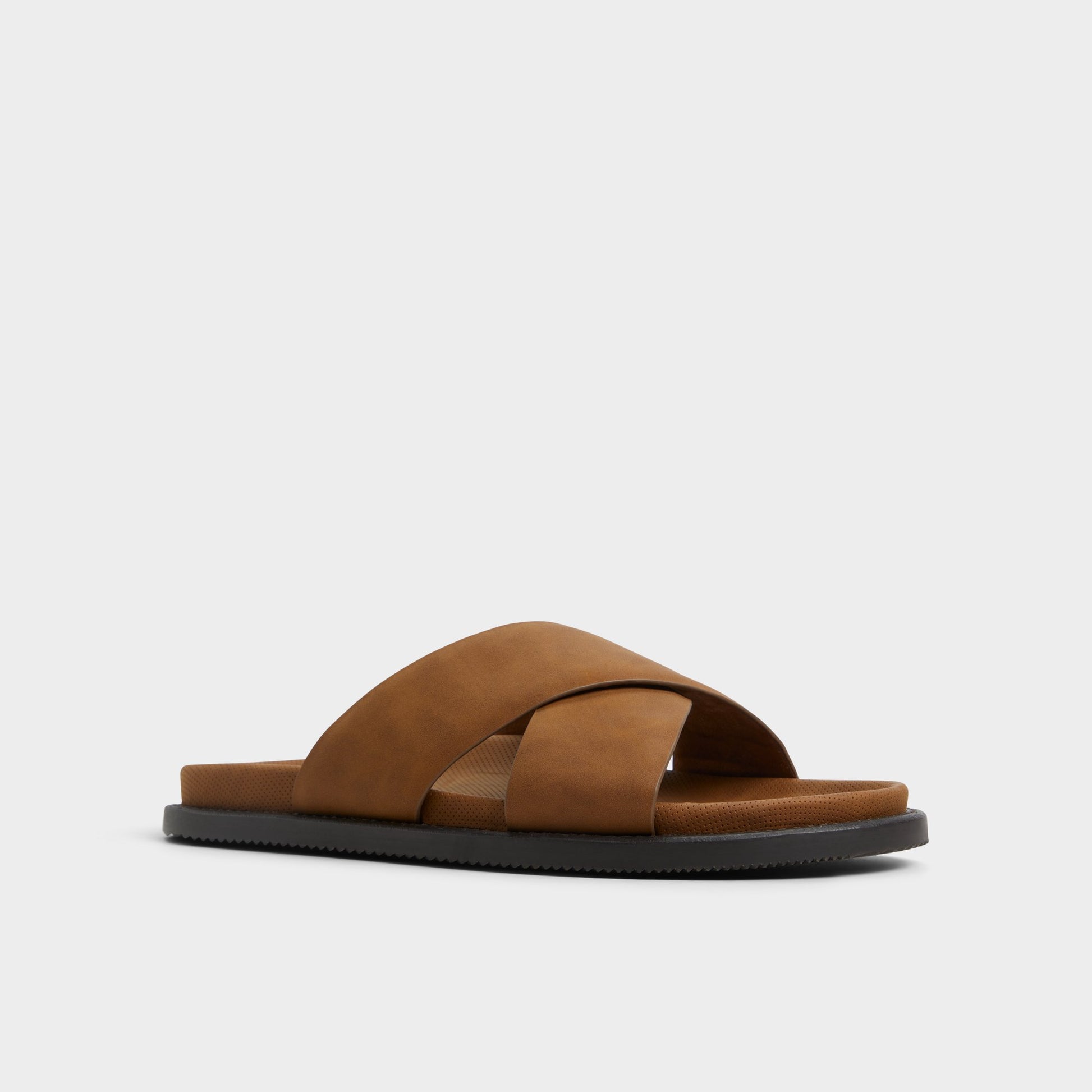 Three-quarter angle of Cognac Marrin Slide sandal's front side