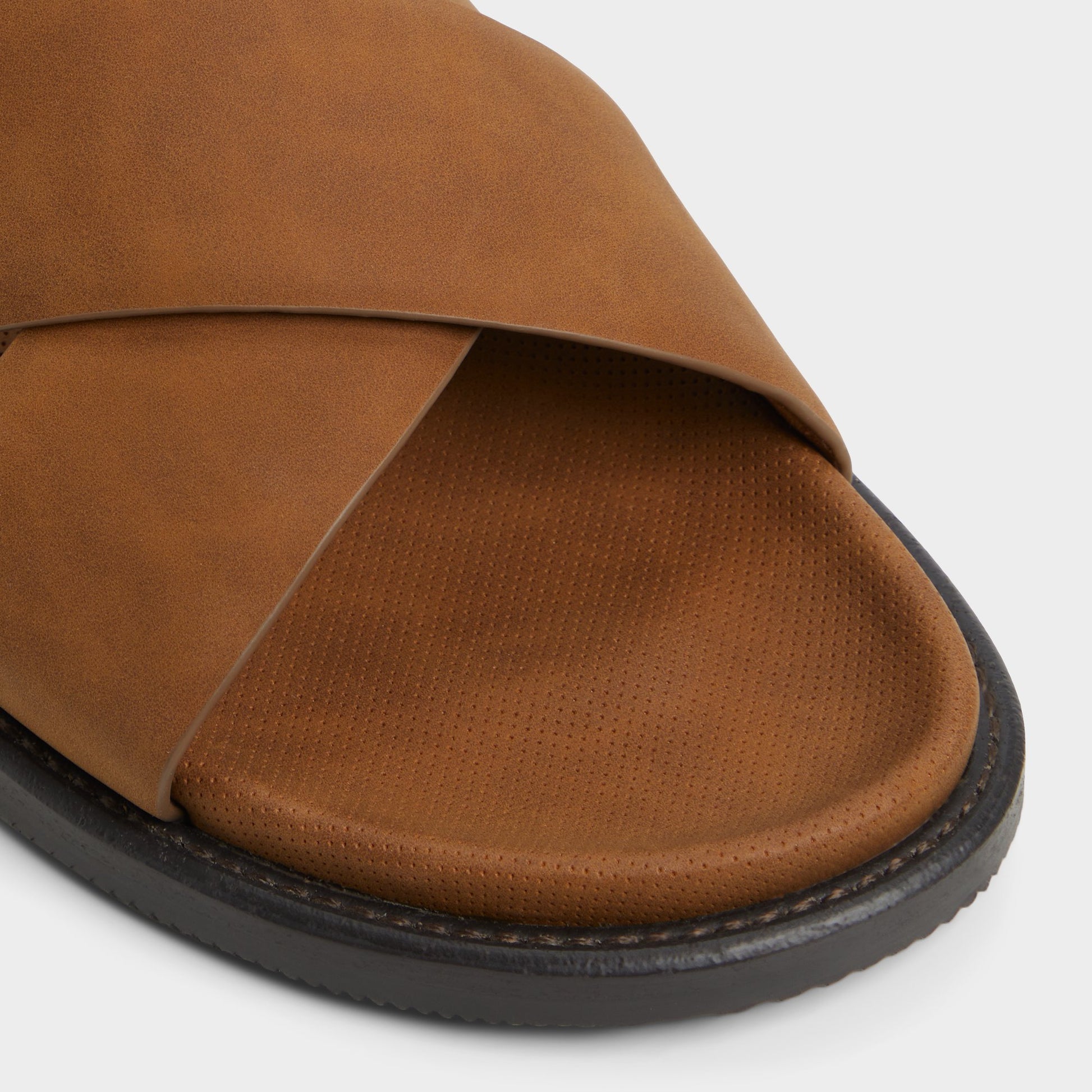 Close-up of the Cognac Marrin Slide sandal