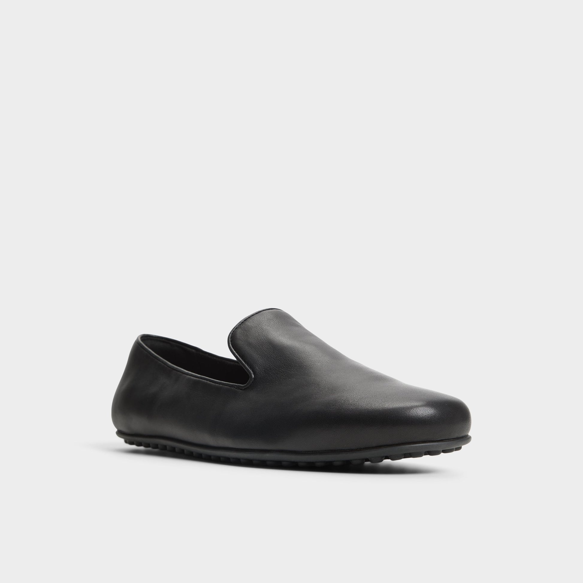 Three-quarter angle of Black Resolute Driving shoe's front side