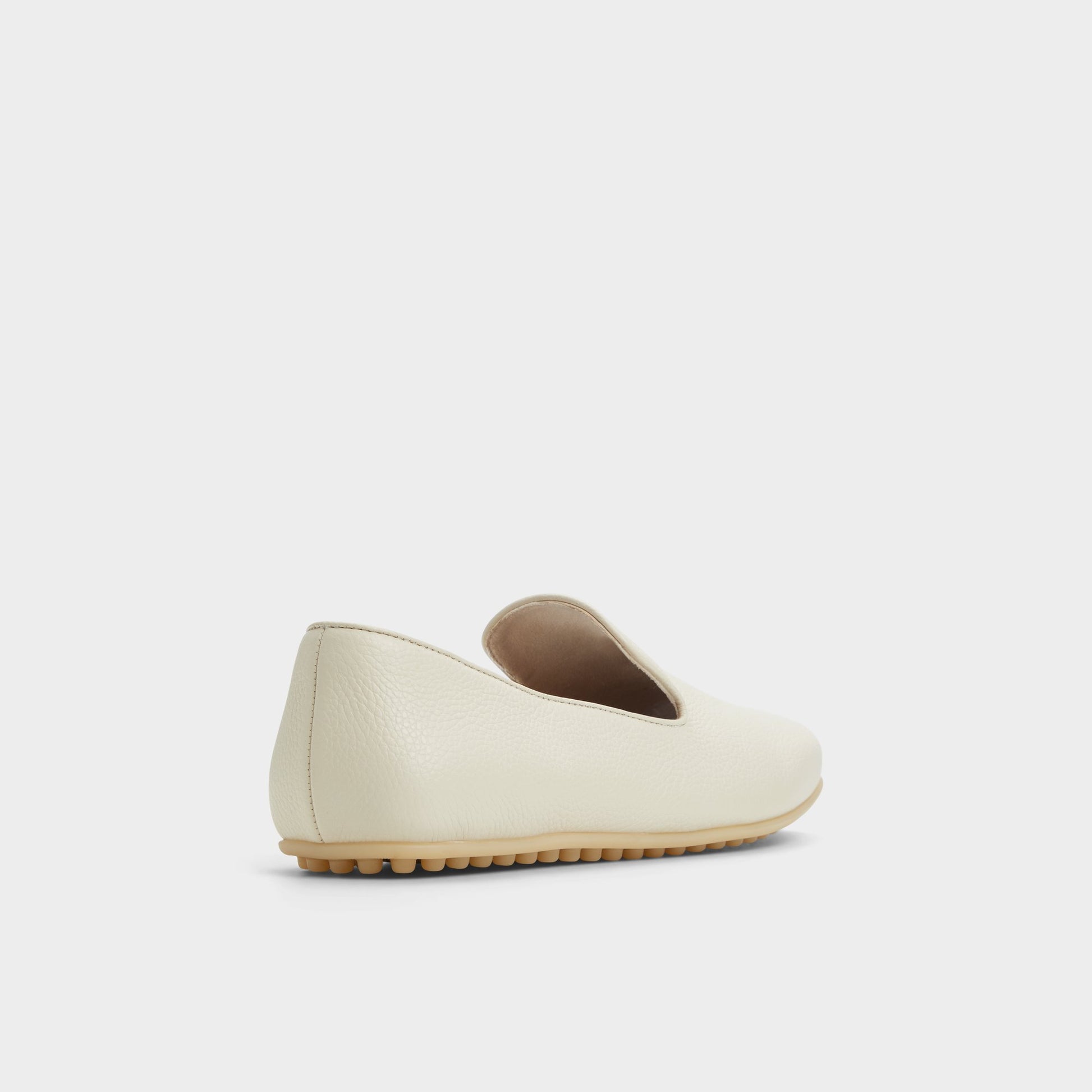 Three-quarter angle of Ivory Resolute Driving shoe's back side