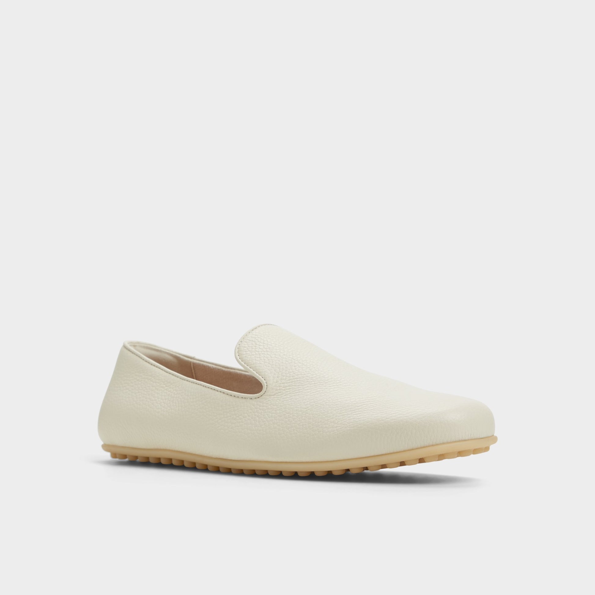 Three-quarter angle of Ivory Resolute Driving shoe's front side