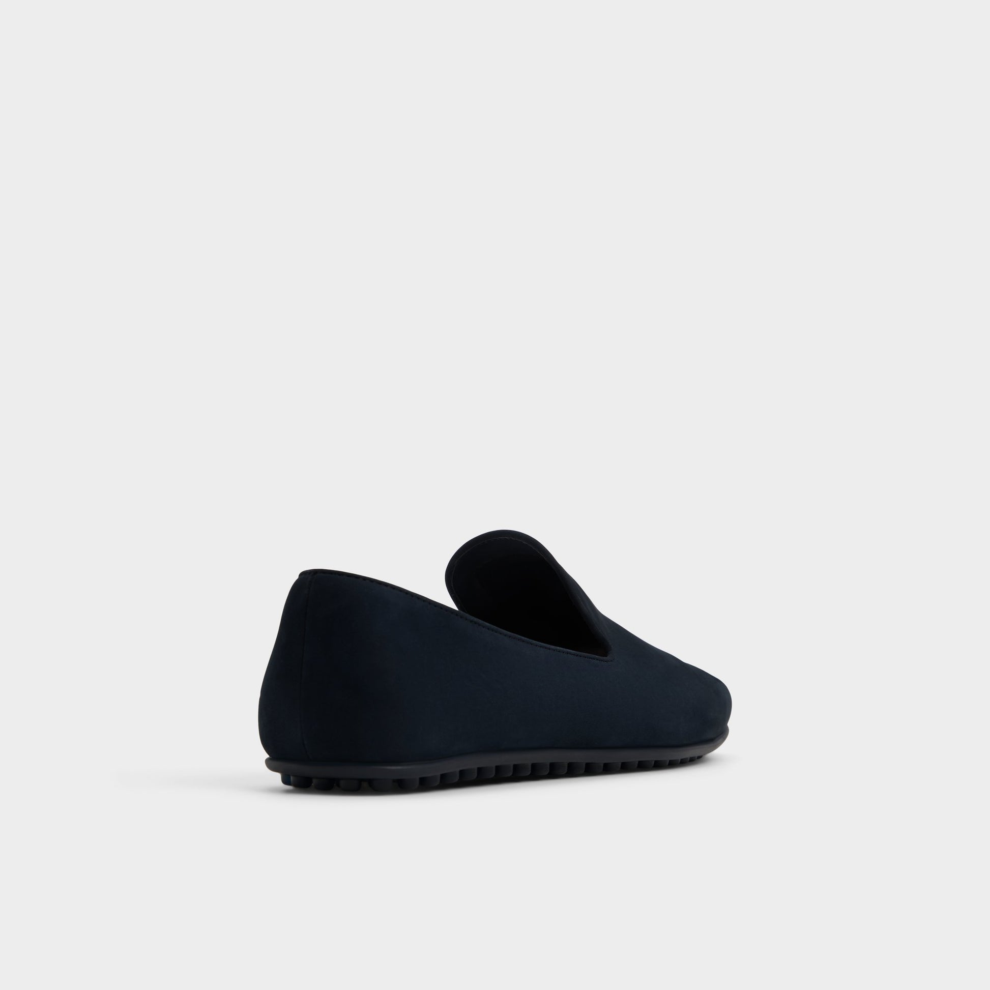 Three-quarter angle of Navy Resolute Driving shoe's back side