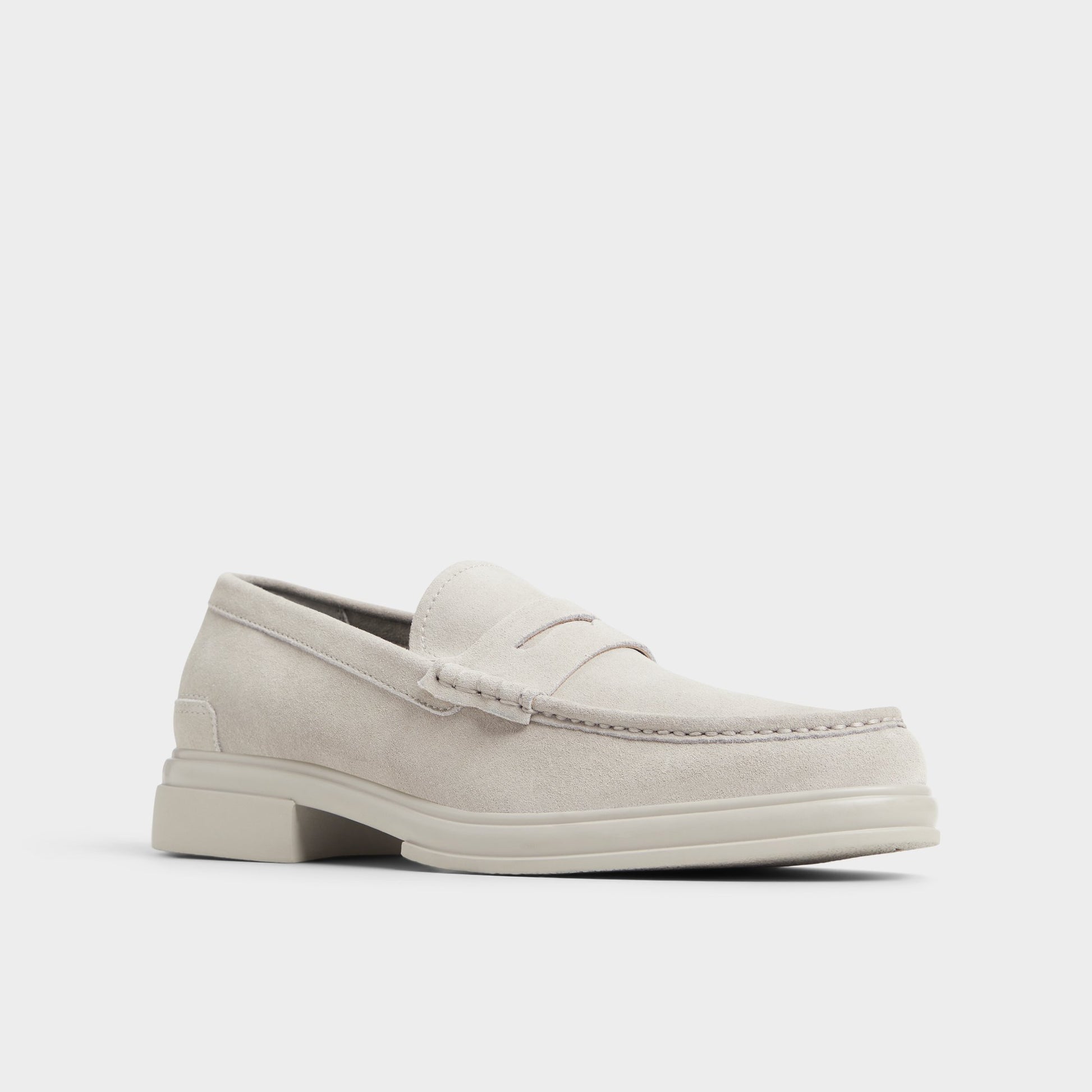 Three-quarter angle of Light Grey Tucker Loafer's front side