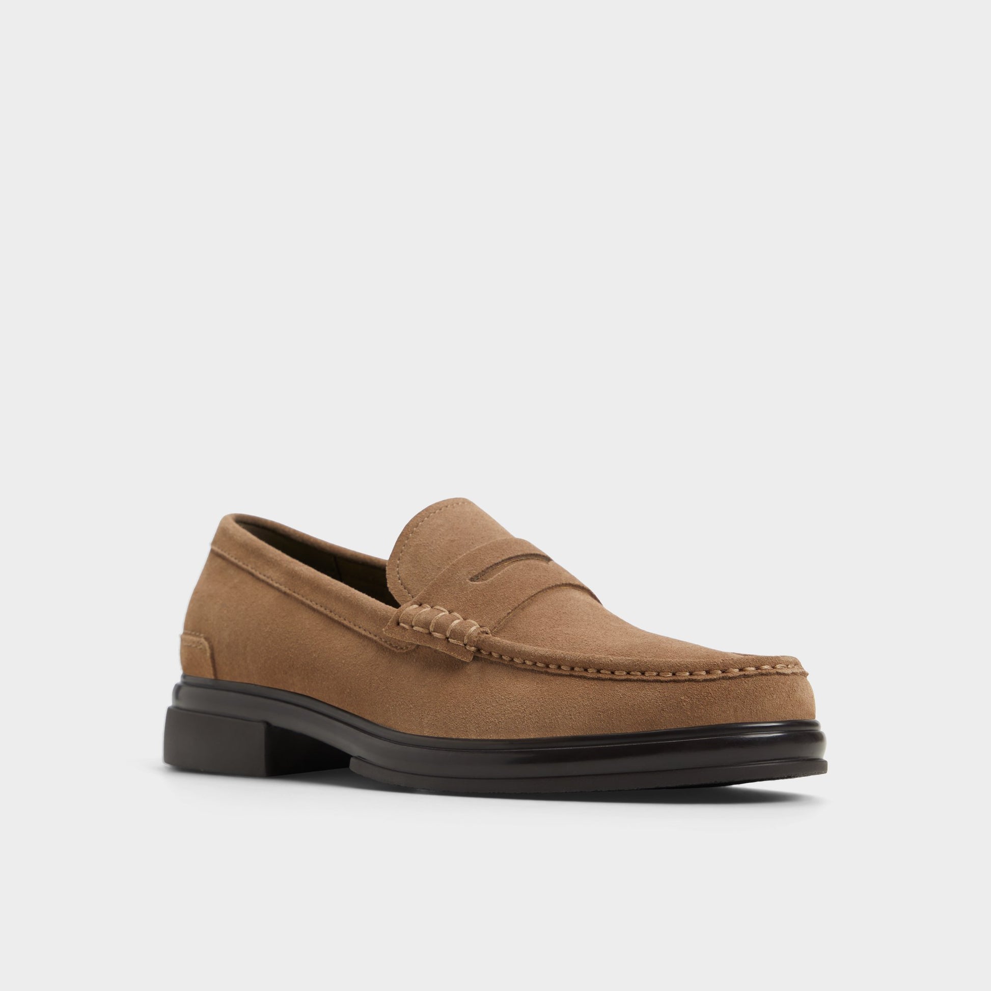Three-quarter angle of Other Brown Tucker Loafer's front side
