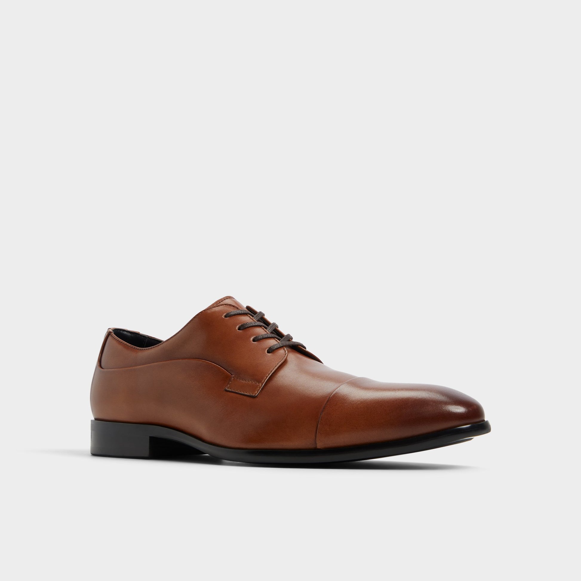 Three-quarter angle of Cognac Daniells Derby shoe's front side