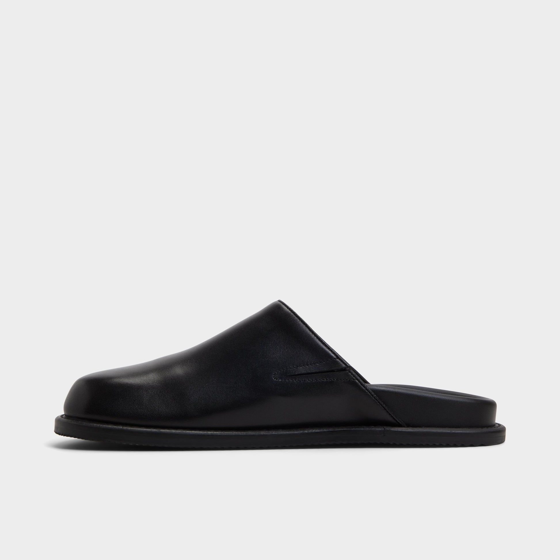 Side view of Open Black Optimism Mule