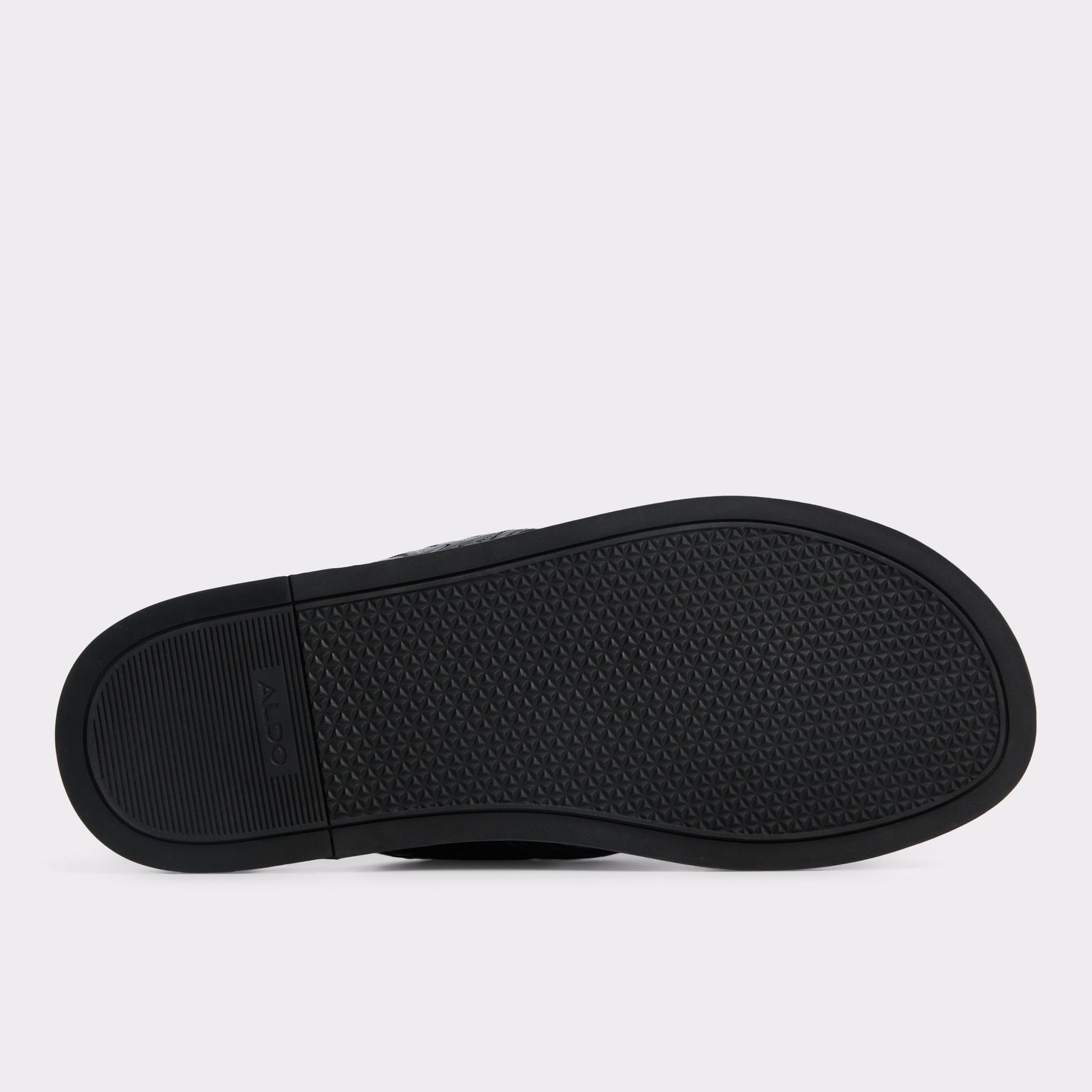View of Open Black Olino Slide sandal's sole